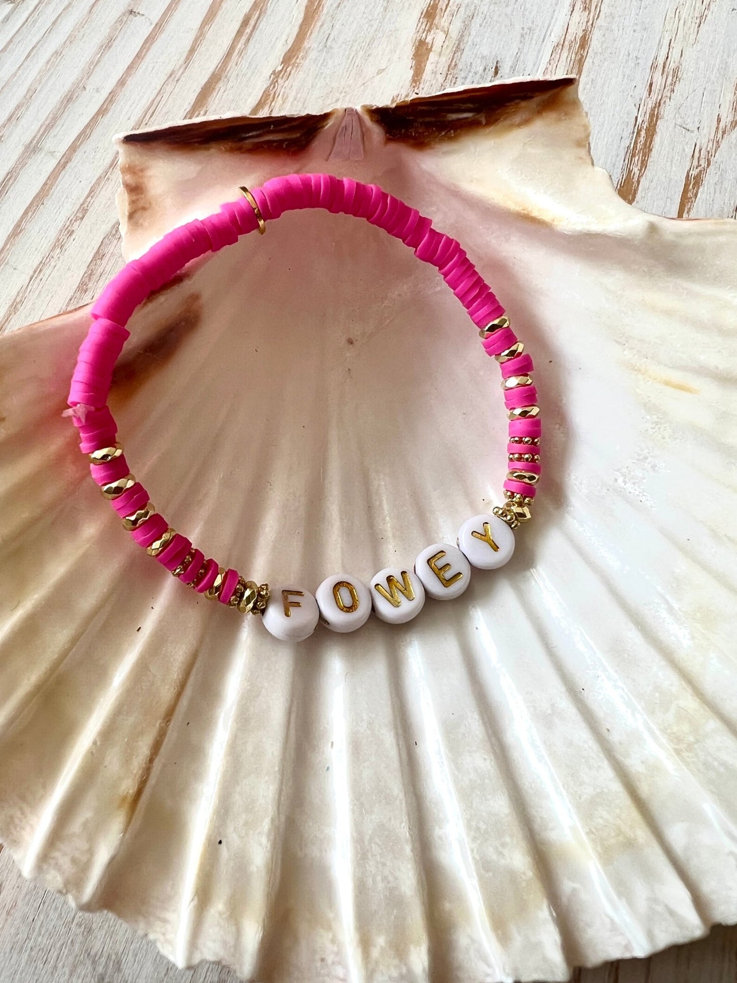 barbie pink sweetie-style beaded bracelet with gold accents and FOWEY letter beads, vibrant coastal handmade jewellery