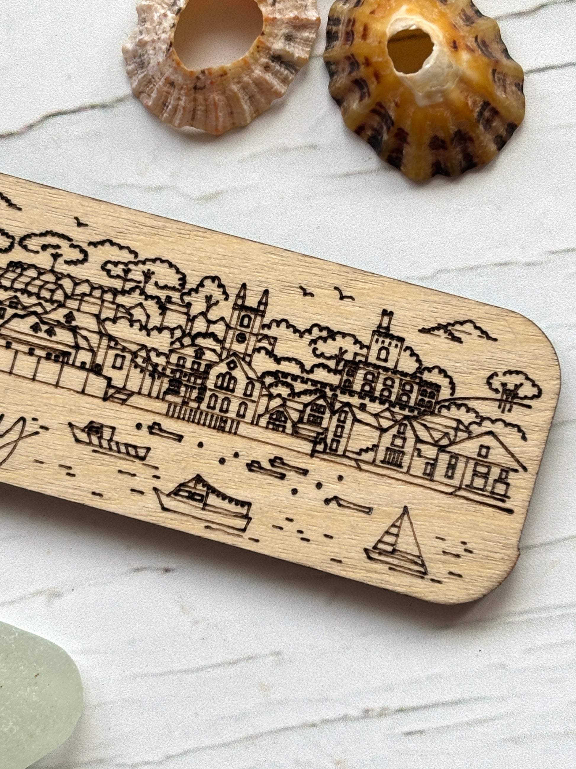 detailed Fowey skyline keyring, engraved Cornwall waterfront scene, wooden boat sail illustration, handmade gift souvenir