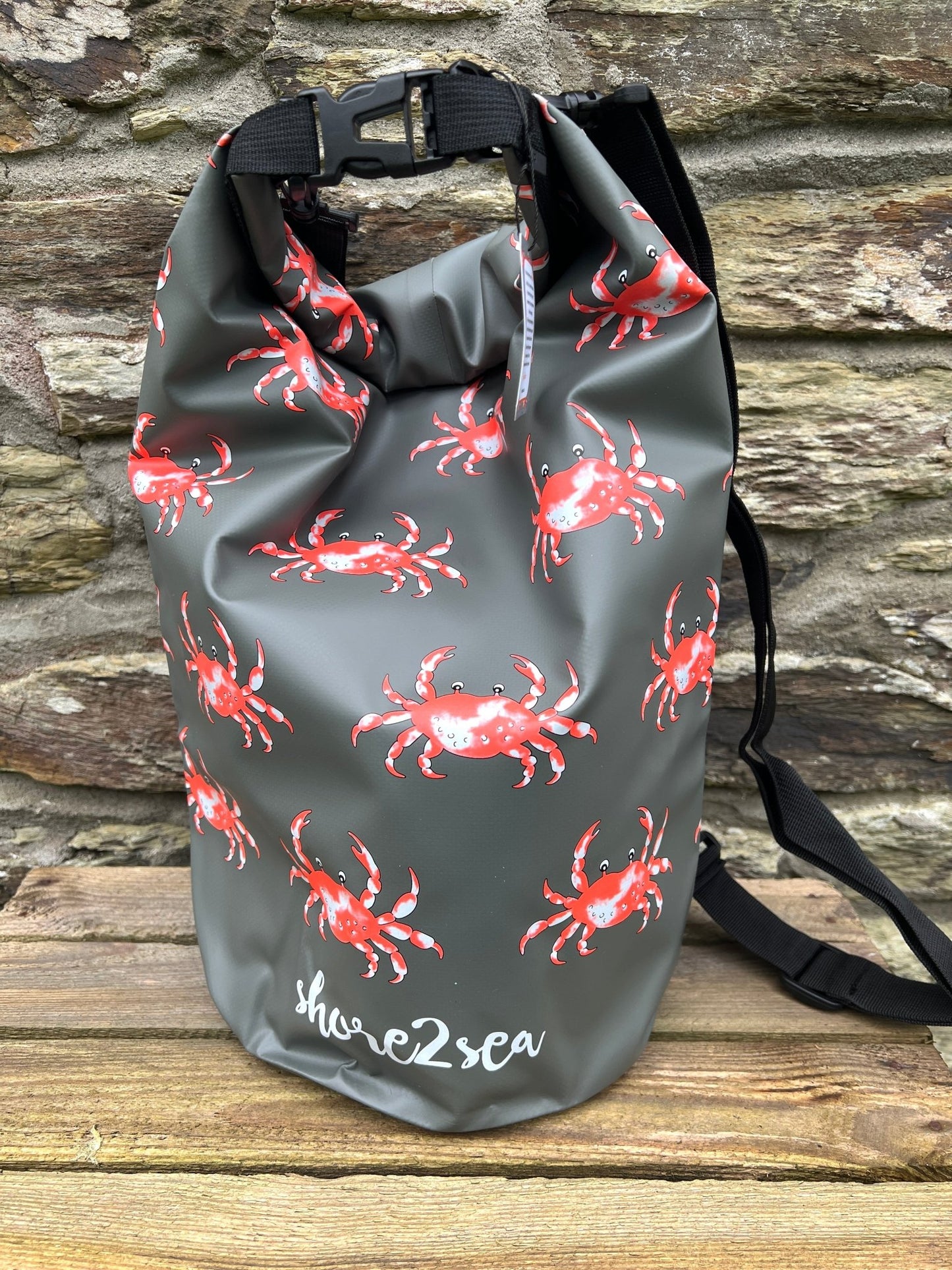 waterproof grey dry bag featuring a nautical crab pattern durable storage for beach trips, SUP, and water activities