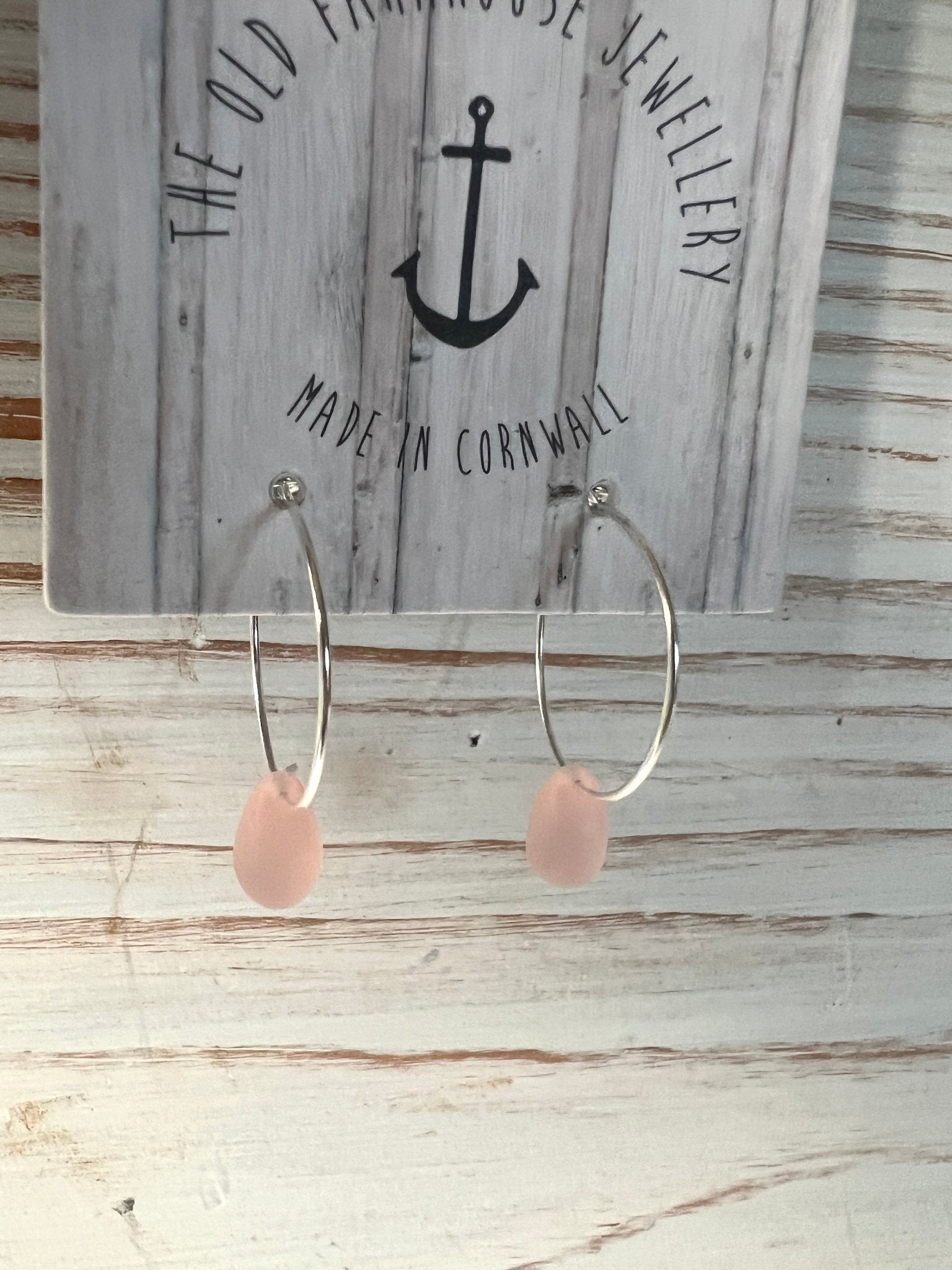 rose pink sea glass style hoop earrings with glass teardrop beads handcrafted coastal jewelry from Cornwall