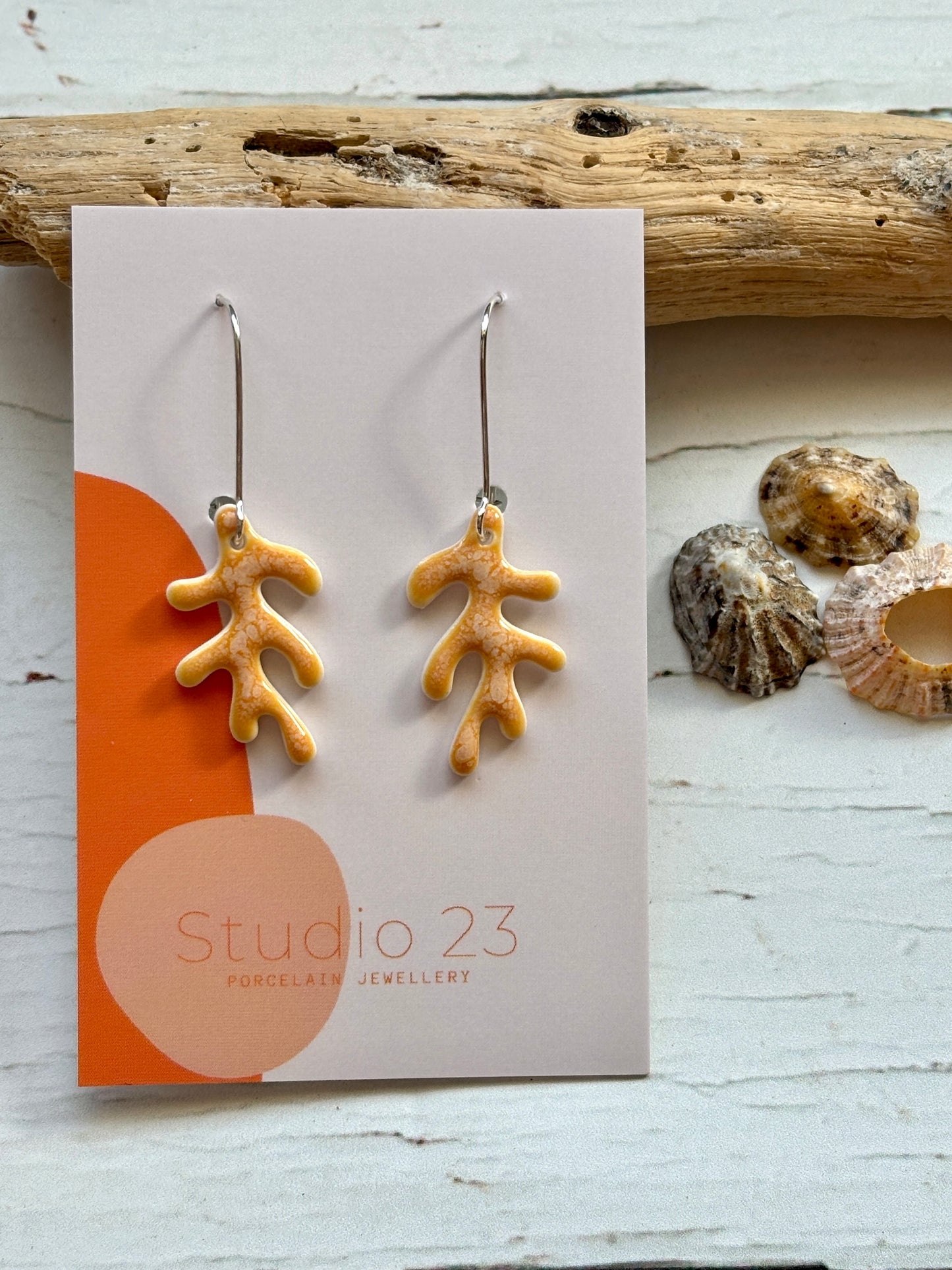 orange glazed porcelain drop earrings handmade ceramic jewelry with sterling silver hooks nautical, beach, or coral reef statement