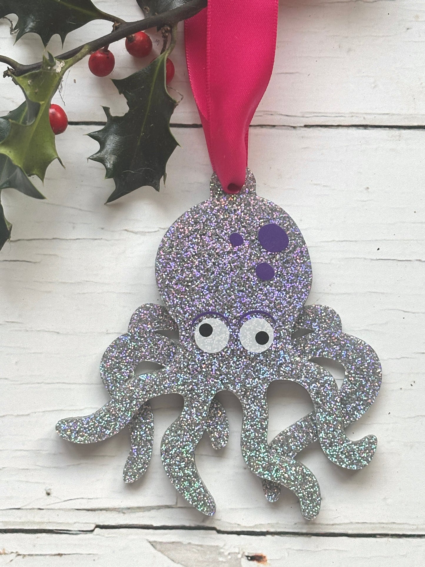 sparkly silver octopus Christmas tree ornament ocean/nautical-themed holiday decor googly eyes and pink satin ribbon