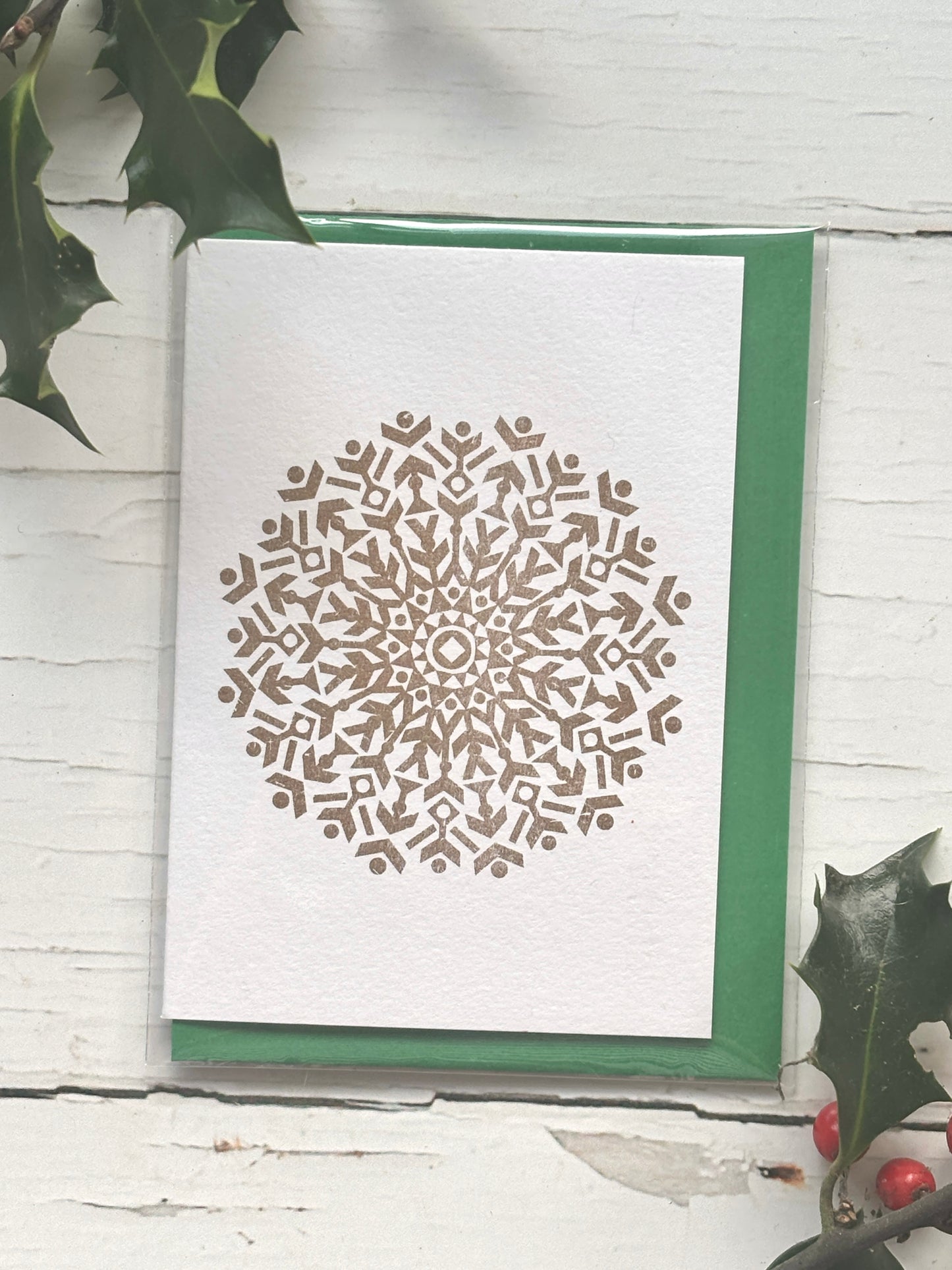 gold snowflake Christmas card—foil-stamped, luxe festive design with green envelope elegant holiday stationery
