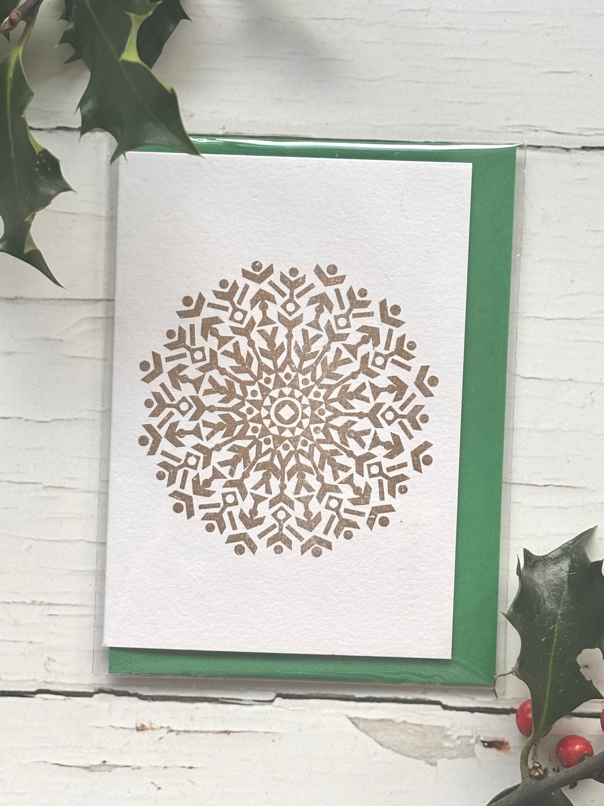 gold snowflake Christmas card—foil-stamped, luxe festive design with green envelope elegant holiday stationery