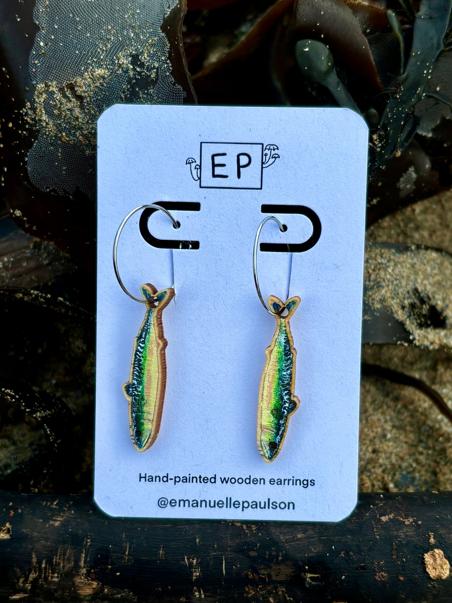 hand painted wooden earrings shaped like a sardine fish funky coastal jewellery with colorful marine life design nautical hoop earrings