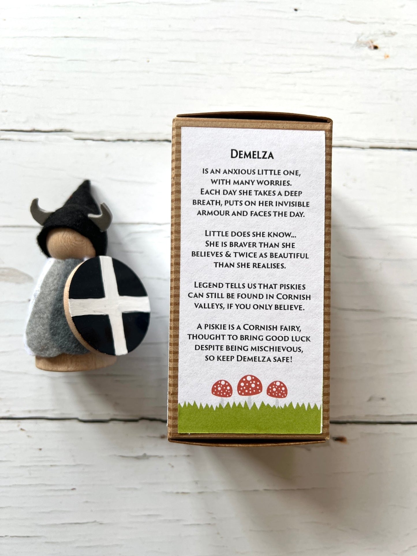 Demelza Cornish piskie—handmade felt doll with shield, horned helmet, scroll, and seashells in folklore gift set
