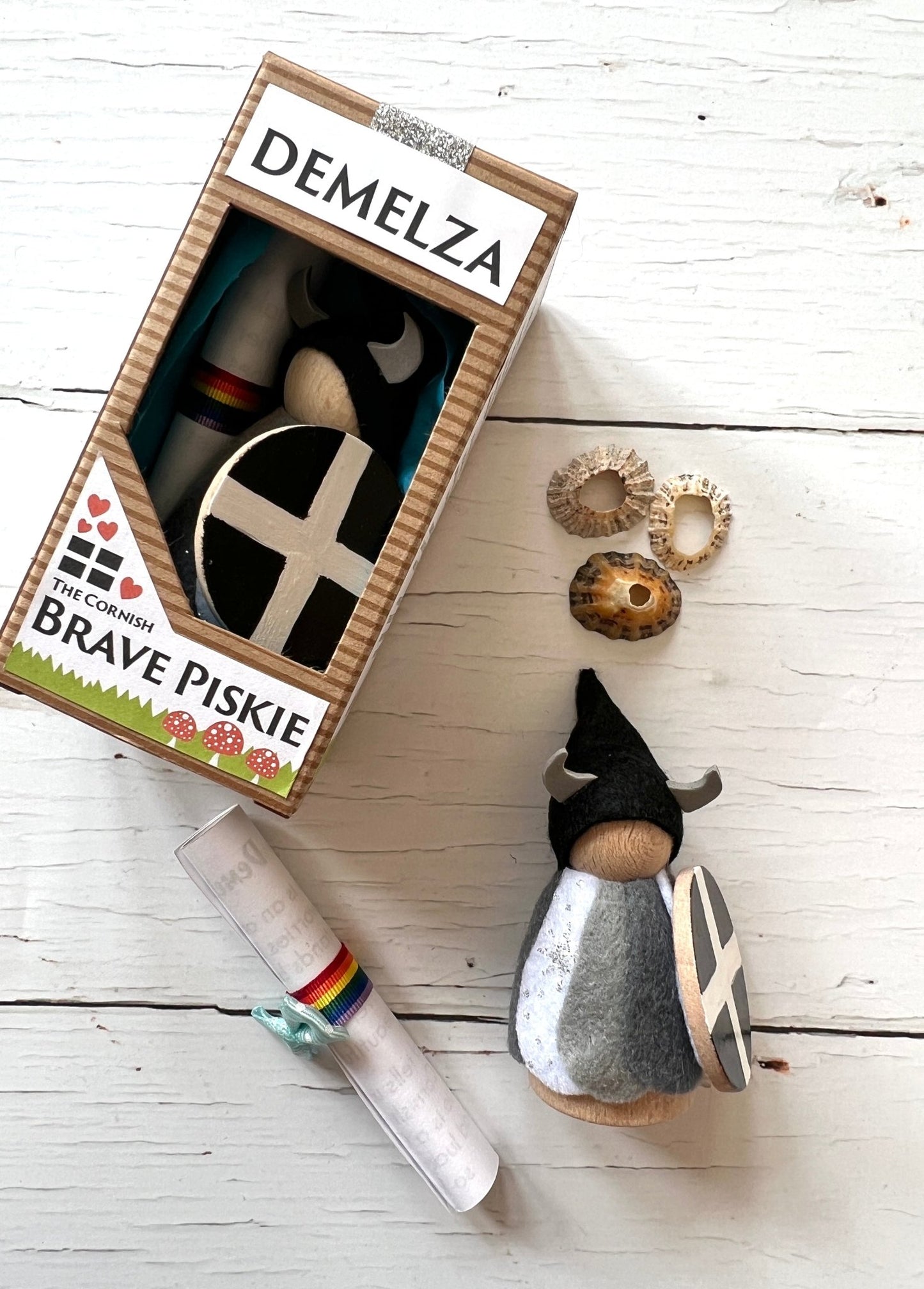 Demelza Cornish piskie—handmade felt fairy with horned helmet, shield, scroll, and seashells in folklore gift box