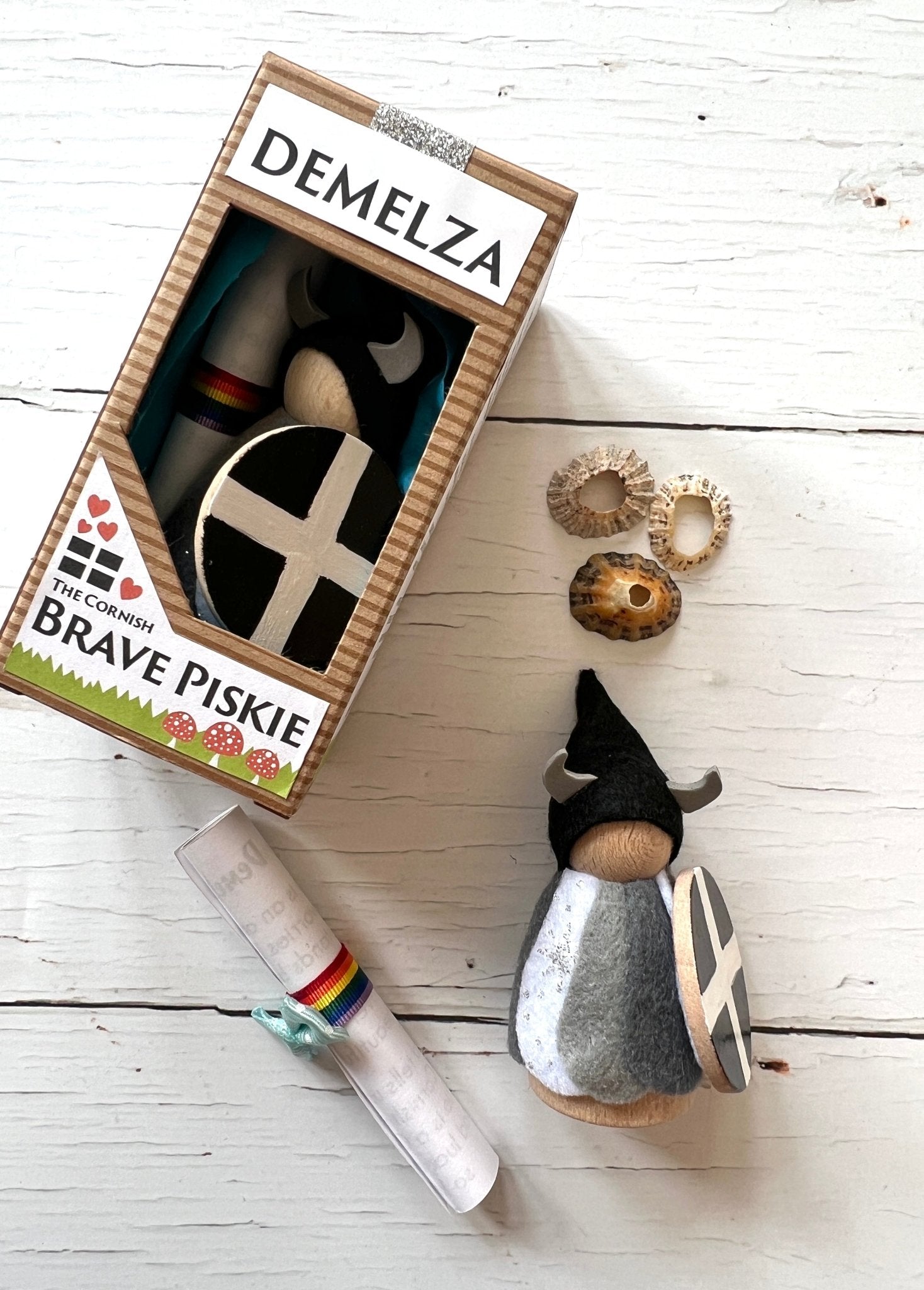 Demelza Cornish piskie—handmade felt fairy with horned helmet, shield, scroll, and seashells in folklore gift box