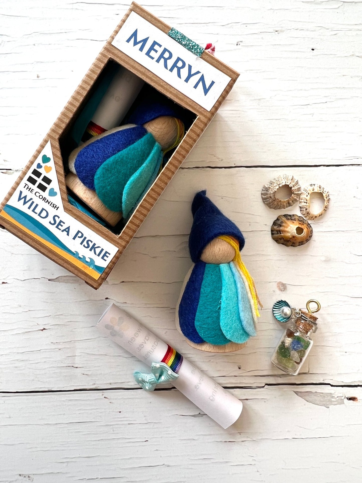 handmade Cornish Piskie Merryn in felt—coastal folklore figurine with sea glass, scroll, and seashell charm gift set