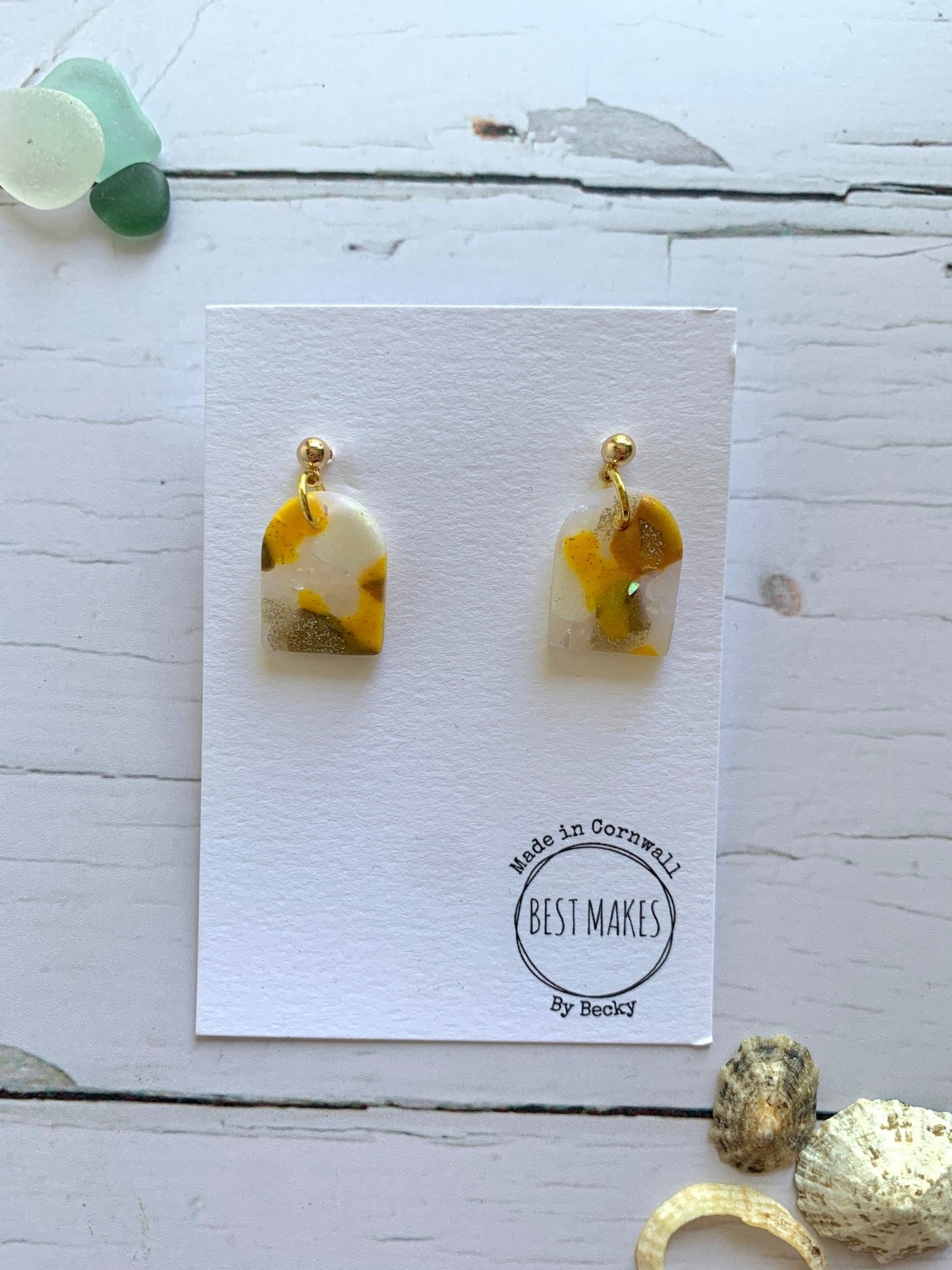 handmade colorful resin earrings—semi-transparent dangles with yellow and brown accents, artisan gift from Cornwall