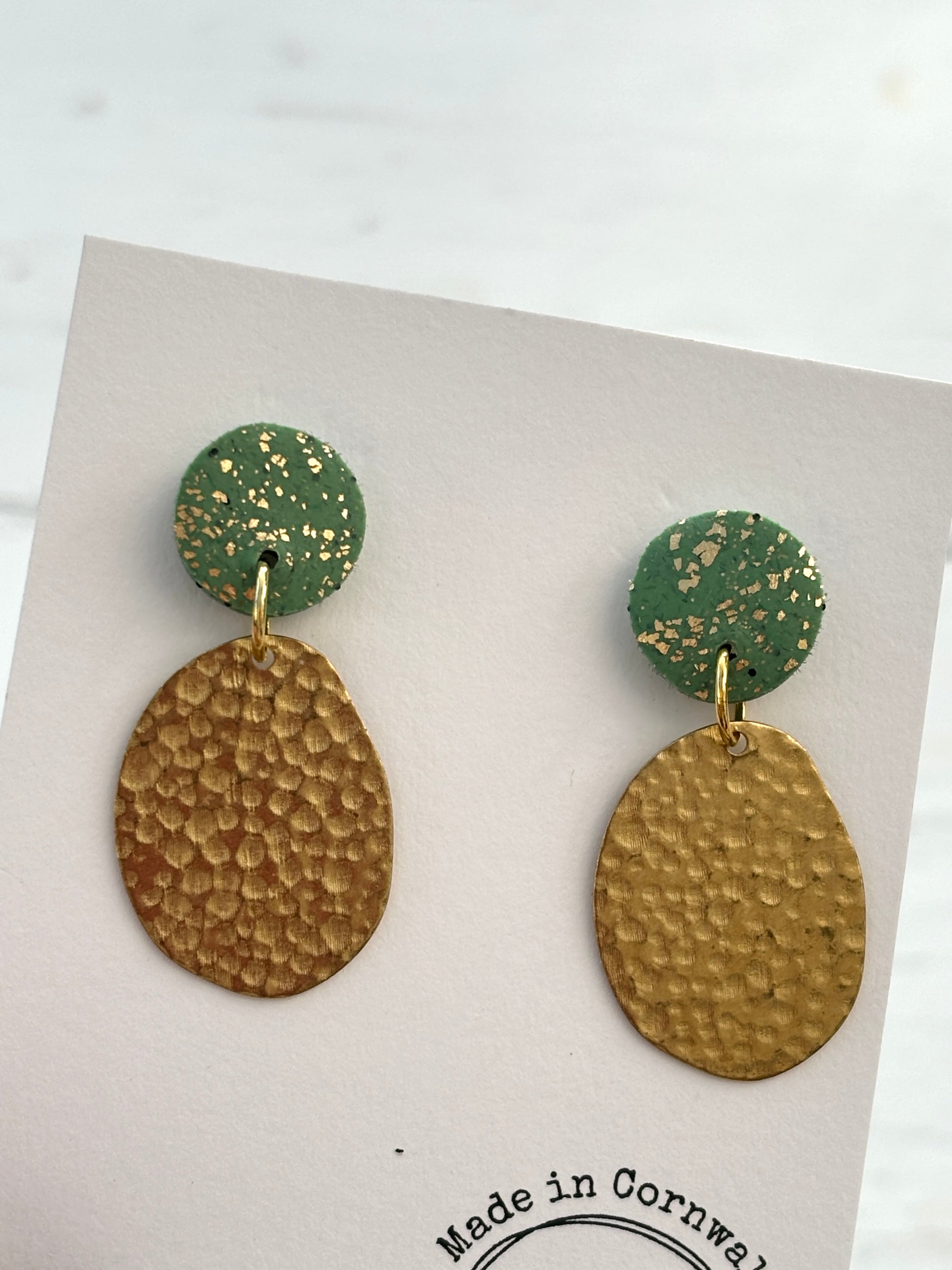 handmade gold statement earrings—green speckled studs with hammered oval dangles, coastal gift made in Cornwall