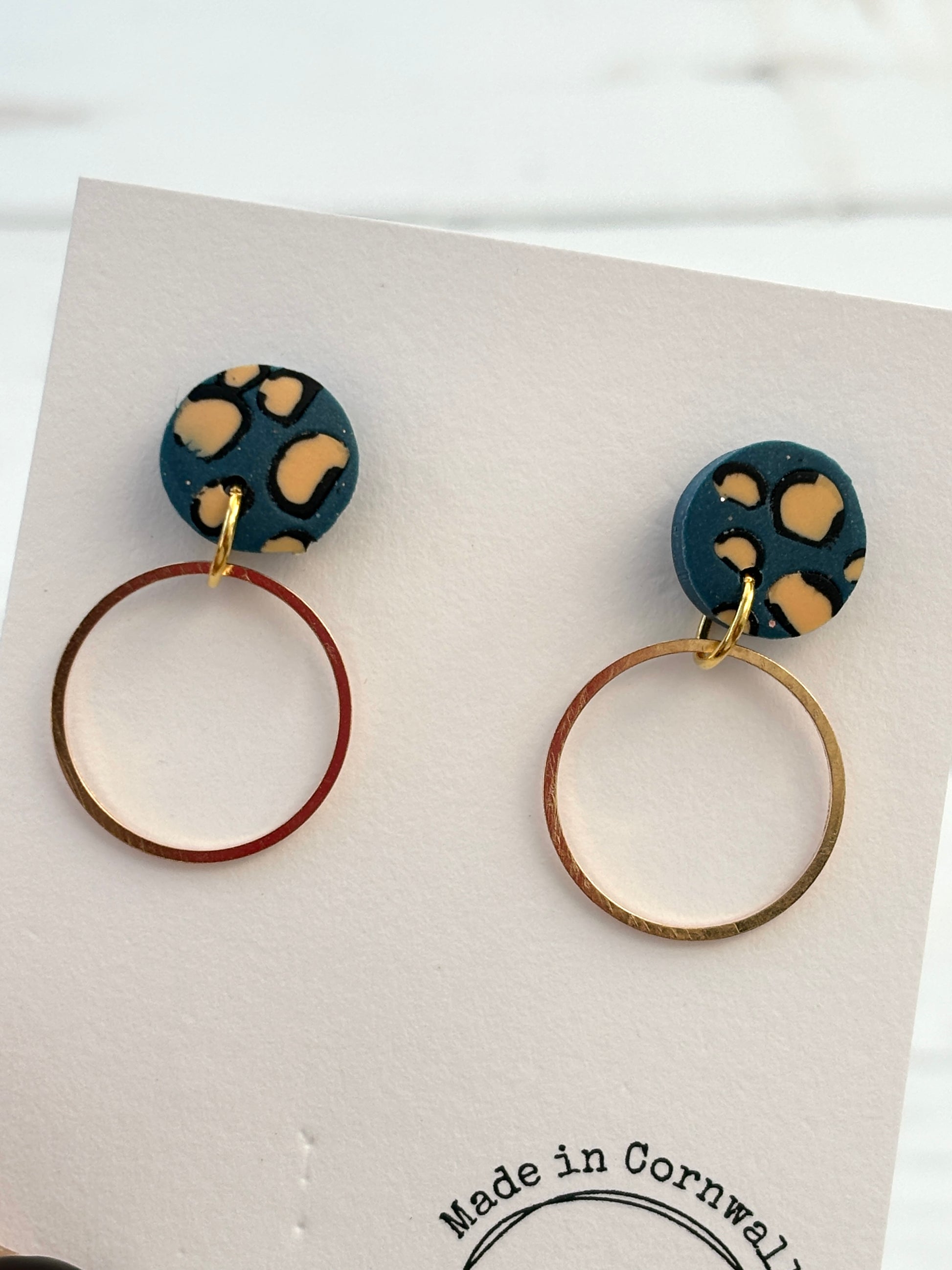 handmade leopard print earrings—blue animal print studs with gold hoops, bold artisan fashion gift