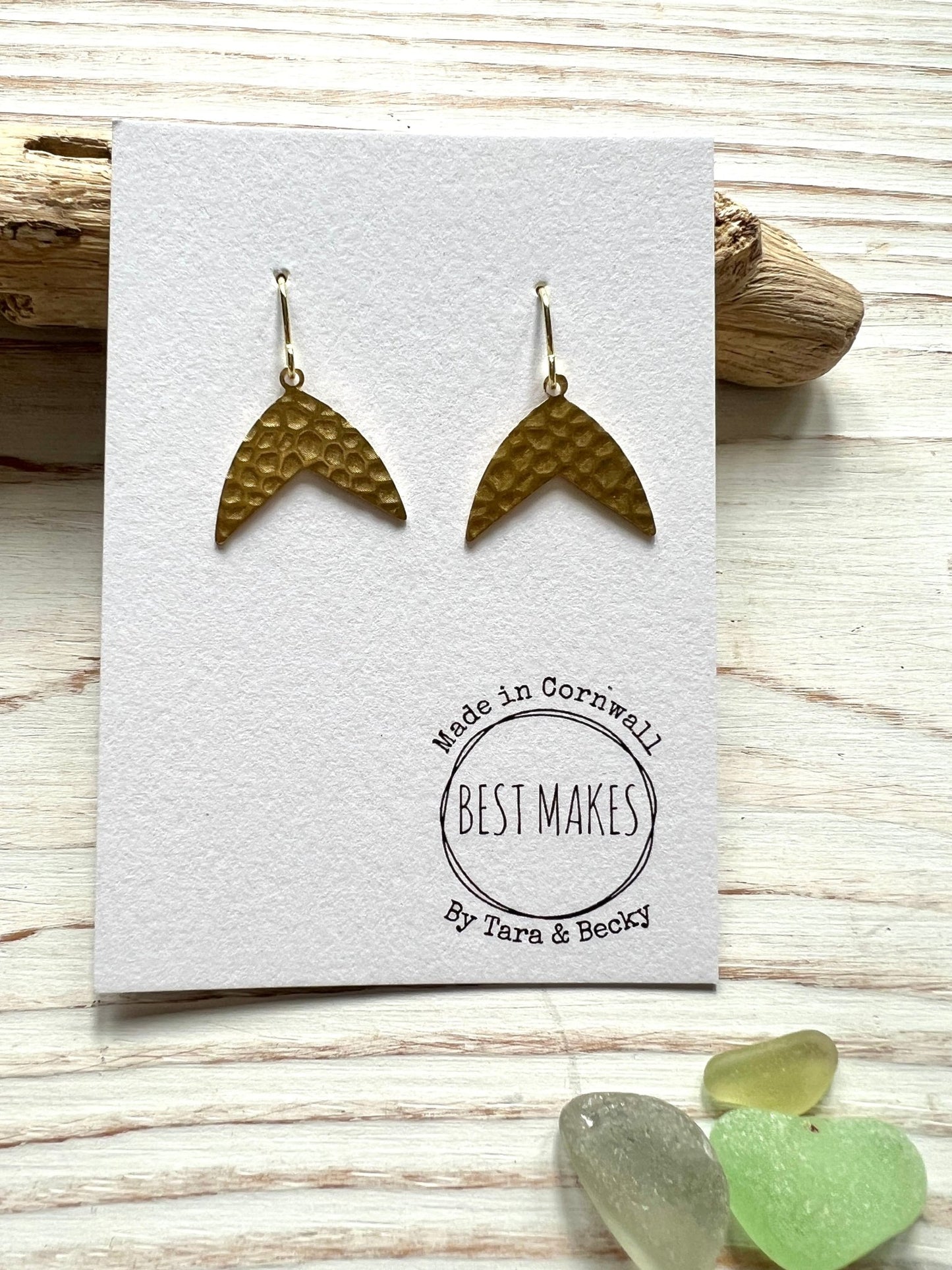 handmade mermaid tail earrings—gold chevron dangles with hammered texture, coastal artisan gift from Cornwall