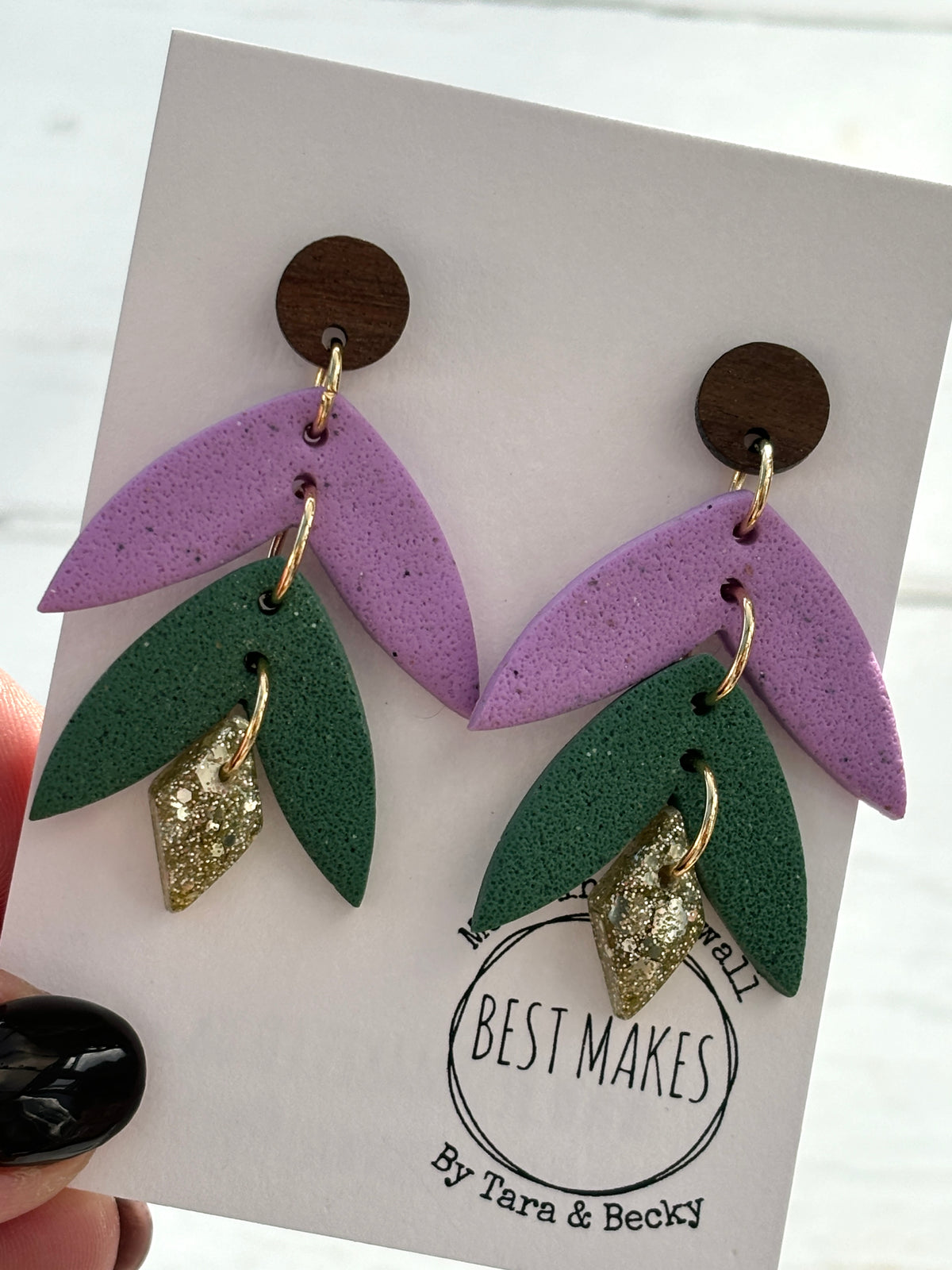 handmade leaf earrings—purple, green, and gold glitter layers with wood studs, bold botanical gift