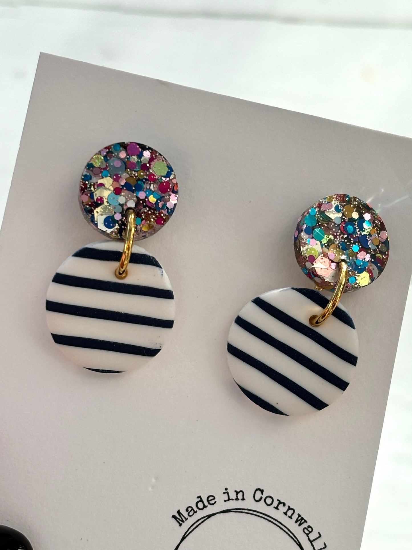 handmade striped earrings—glitter stud with navy diagonal stripes on white dangle, bold coastal gift