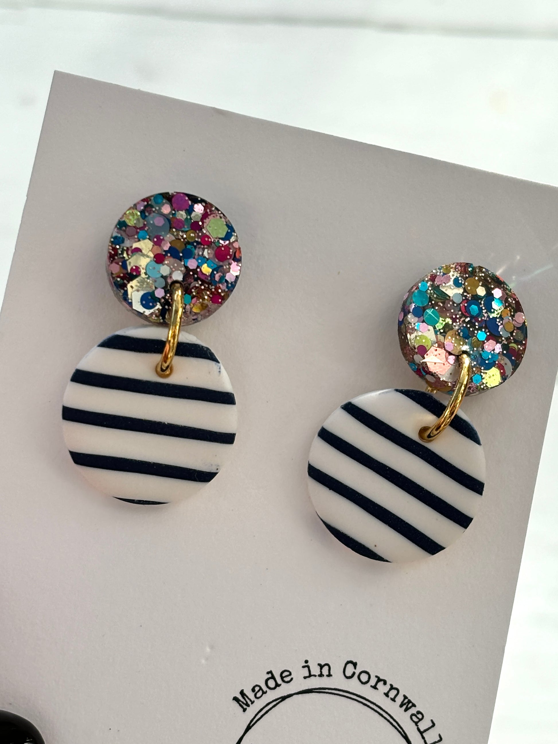 handmade striped earrings—glitter stud with navy diagonal stripes on white dangle, bold coastal gift