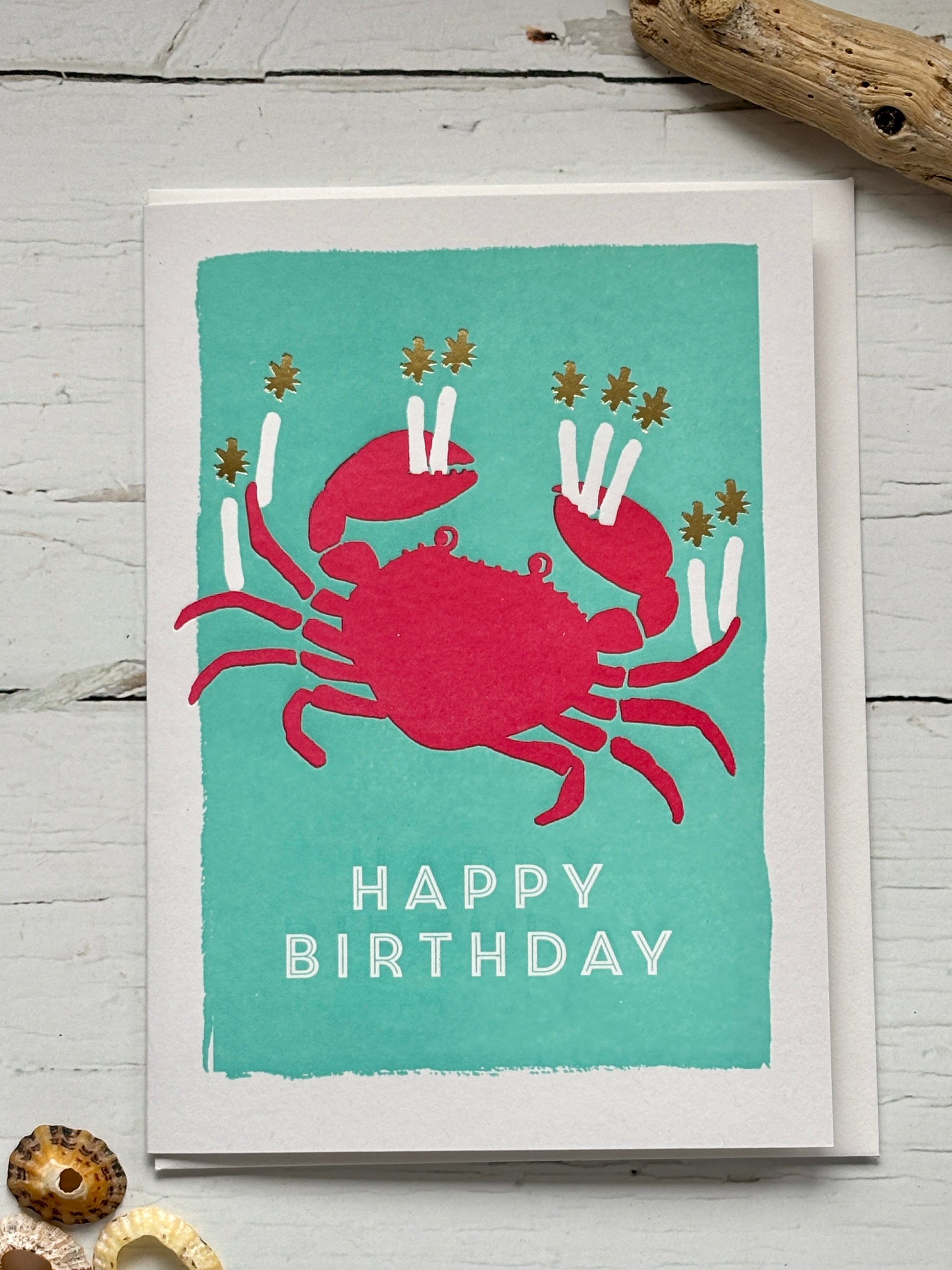 crab birthday card—red crab with candle claws on teal, playful coastal design for ocean lovers and festive summer gifting