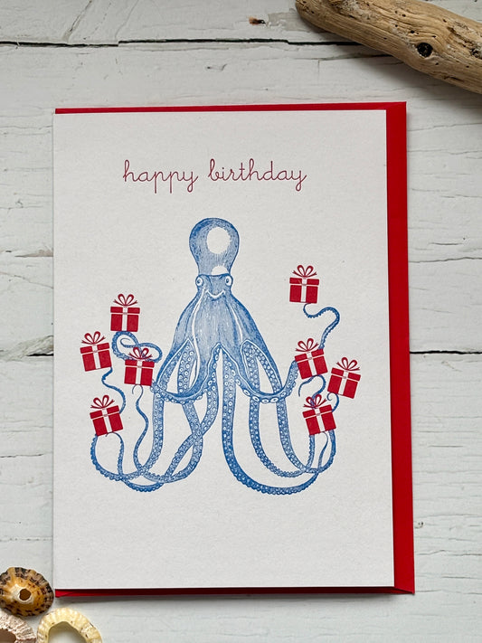 octopus birthday card—blue background with red gifts, fun ocean-themed design for whimsical coastal gifting and celebrations