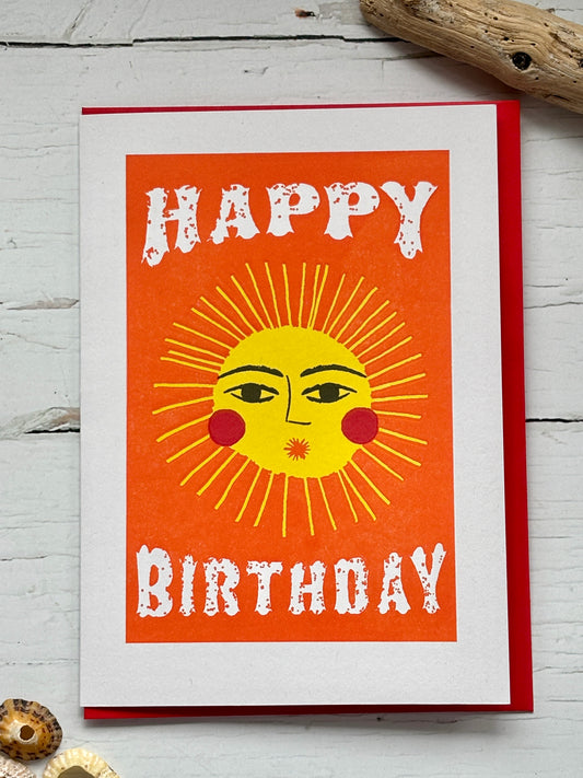 sunshine birthday card—bold sun face on orange with white text, perfect for cheerful gifting and coastal-inspired celebrations