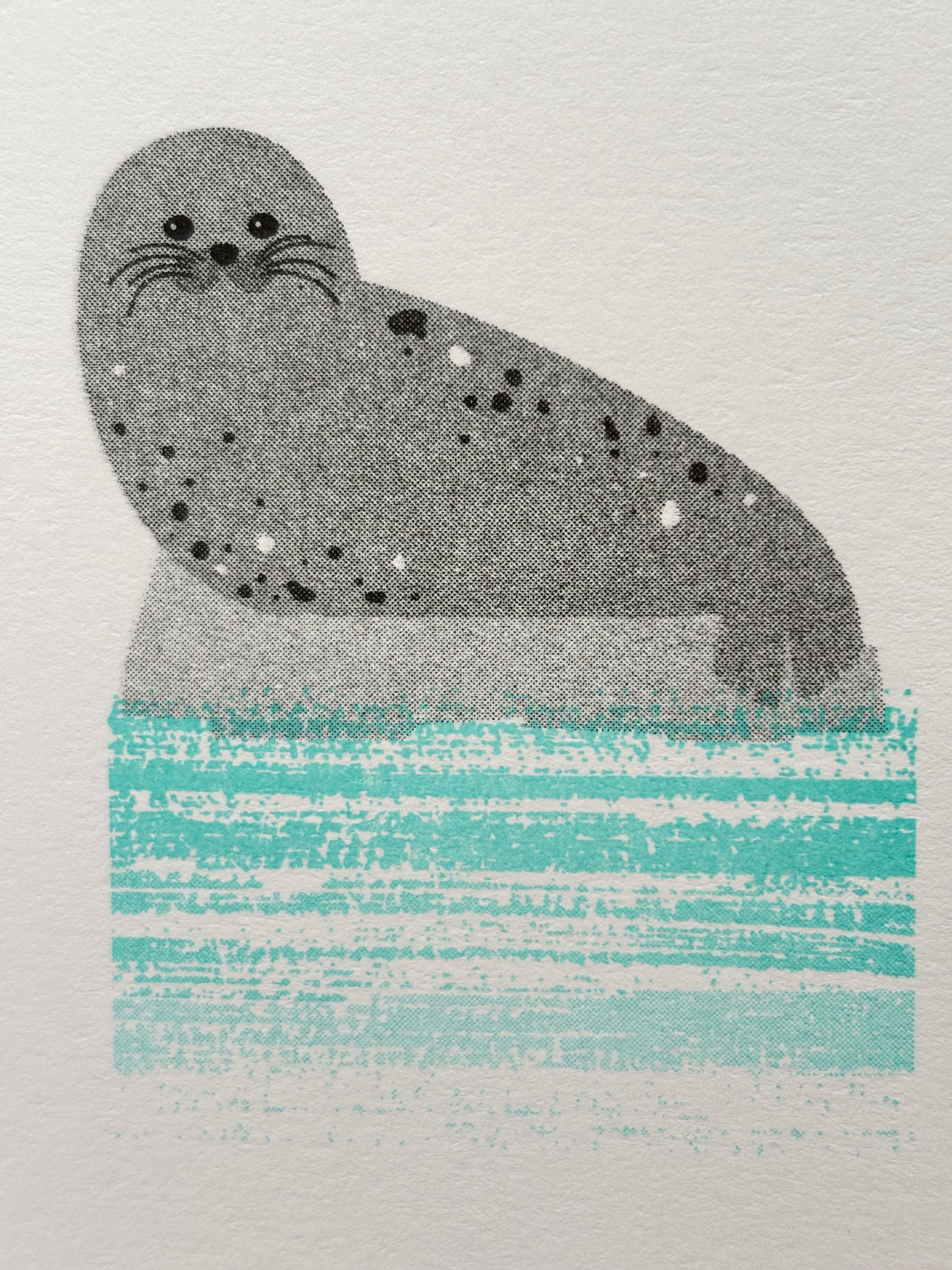 cute seal mini card—gray spotted seal on blue waves, handmade coastal stationery with minimalist charm