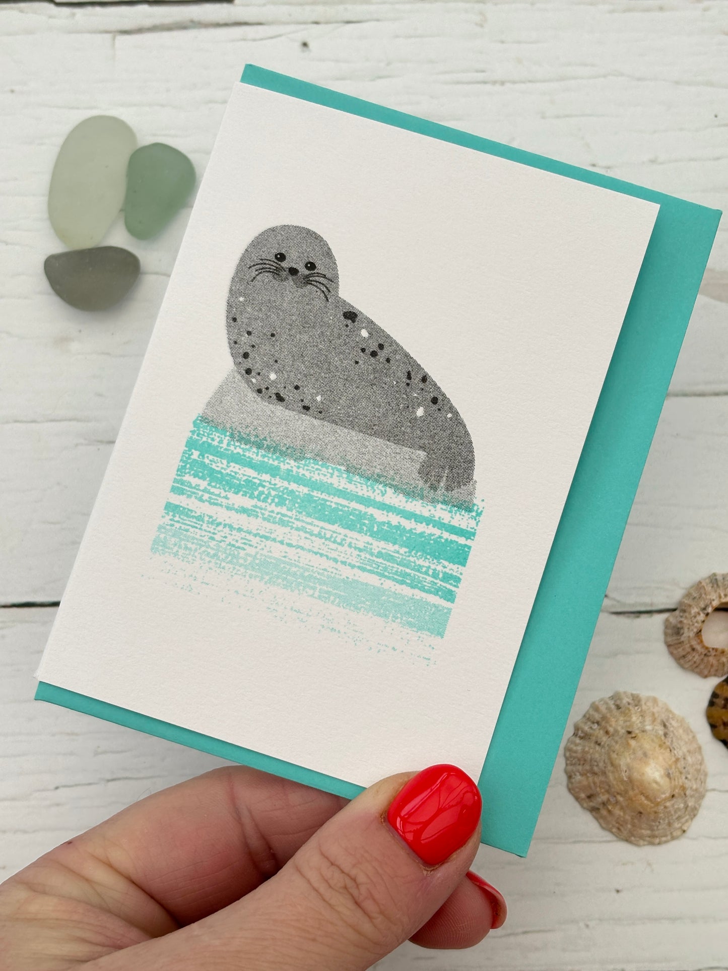mini seal greeting card—cute gray seal on blue waves, handmade coastal stationery with turquoise envelope