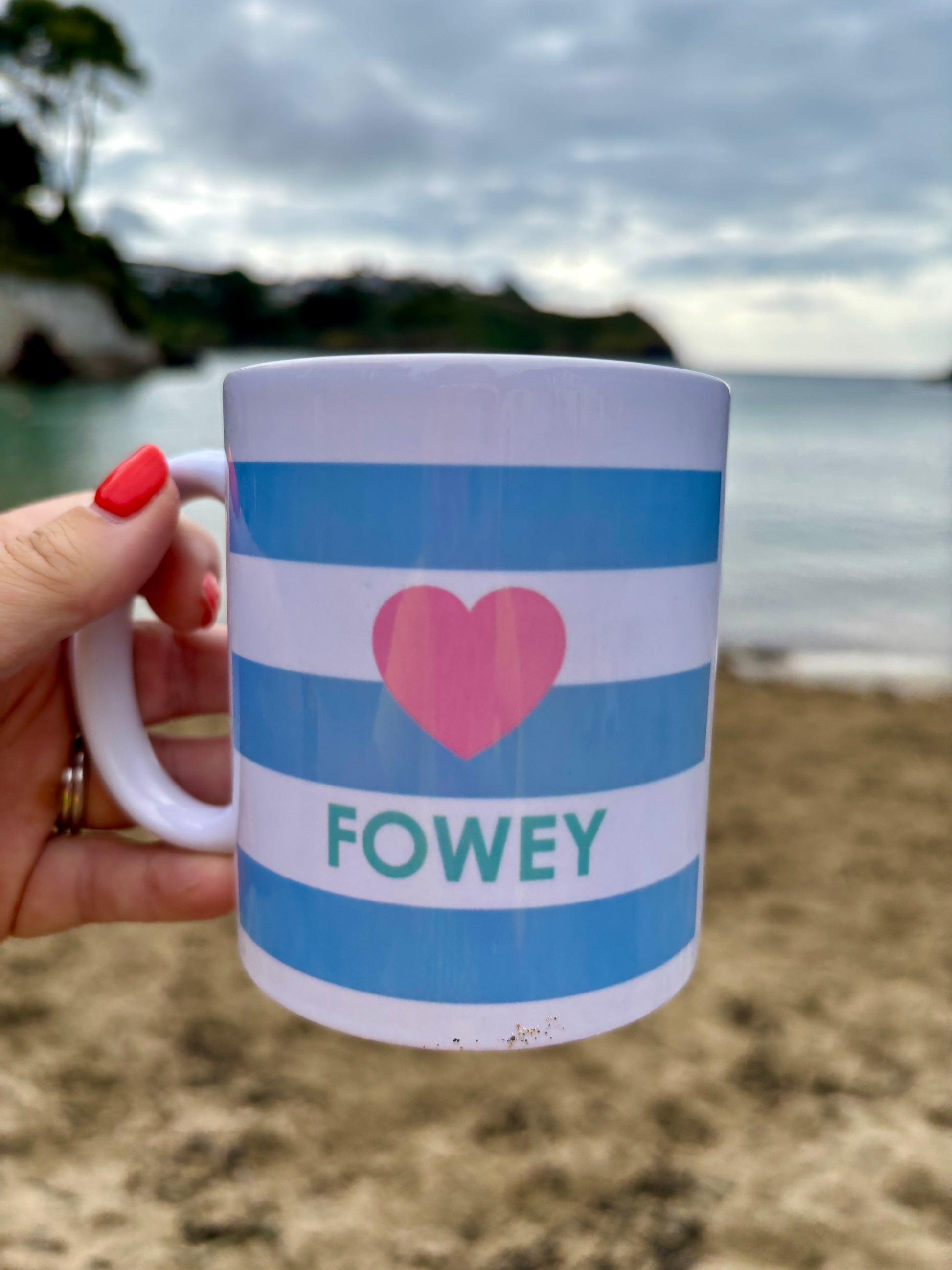 Fowey ceramic mug—blue and white stripes with pink heart, coastal keepsake for beach lovers and Cornwall fans