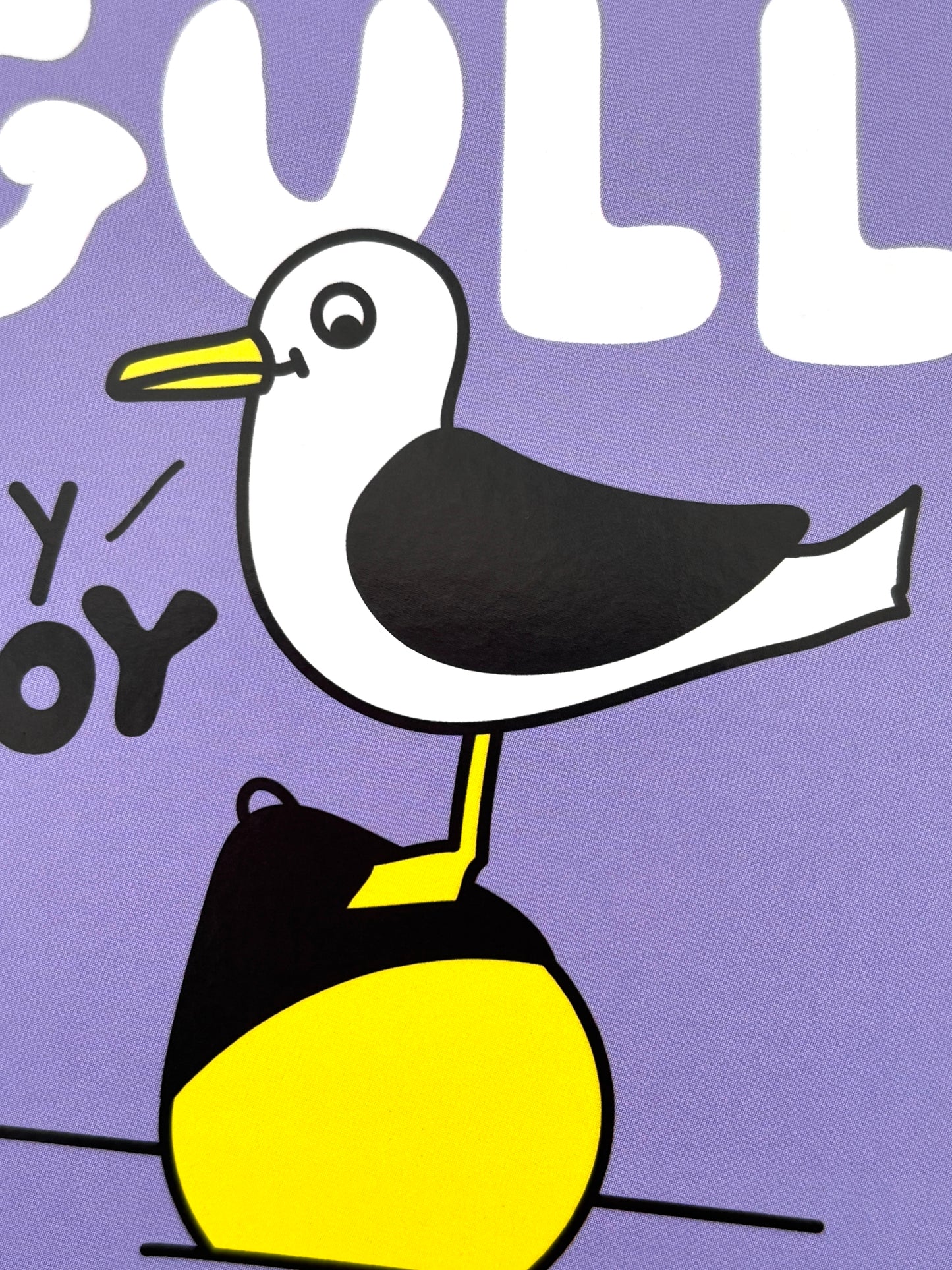 closeup shot of nautical pun postcard—“Hey Gull Hey Buoy” seagull on buoy, bold coastal design with playful seaside charm