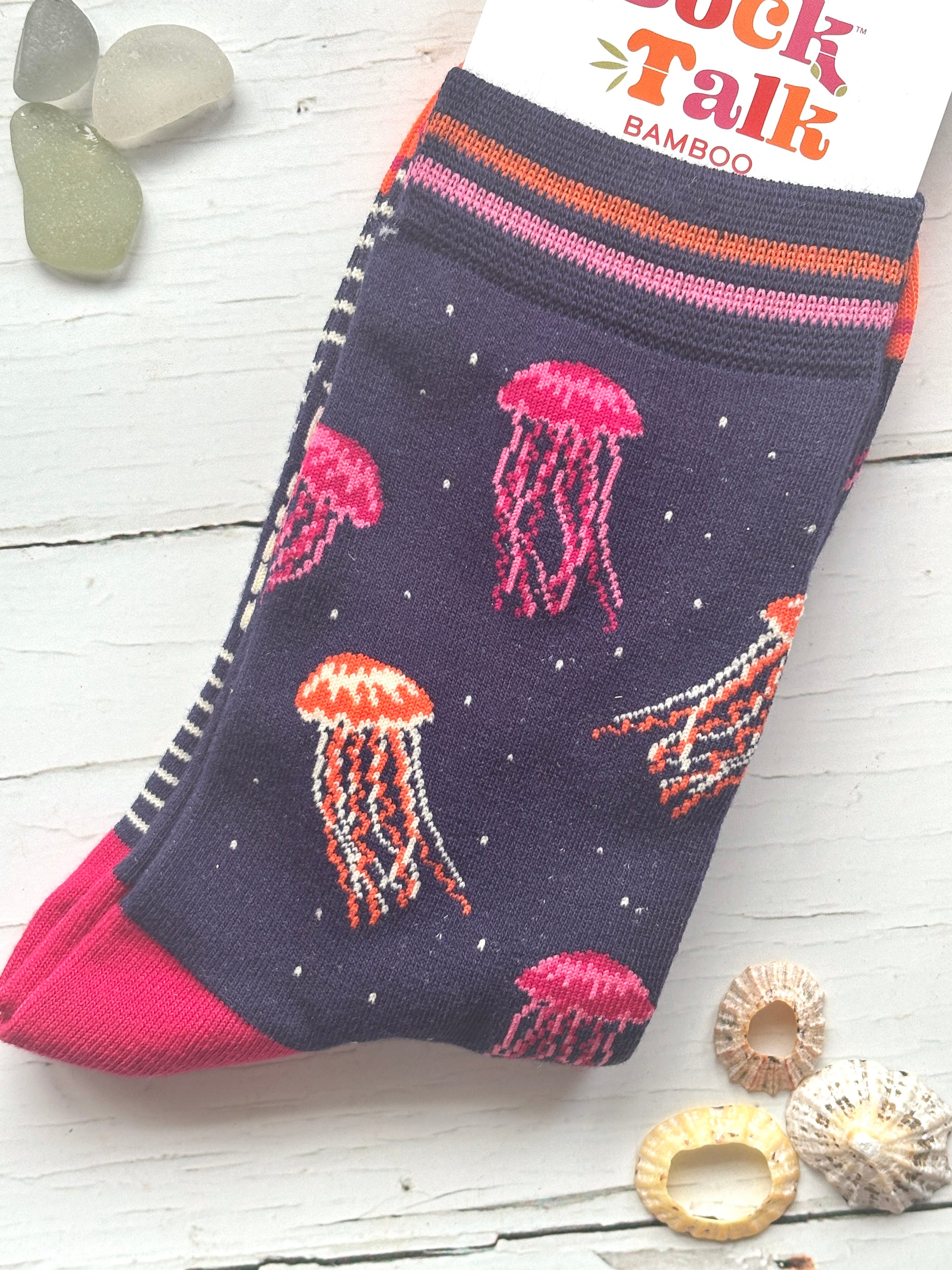 navy blue bamboo socks by Sock Talk featuring a vibrant knitted jellyfish print unique coastal apparel and sea animal novelty gift