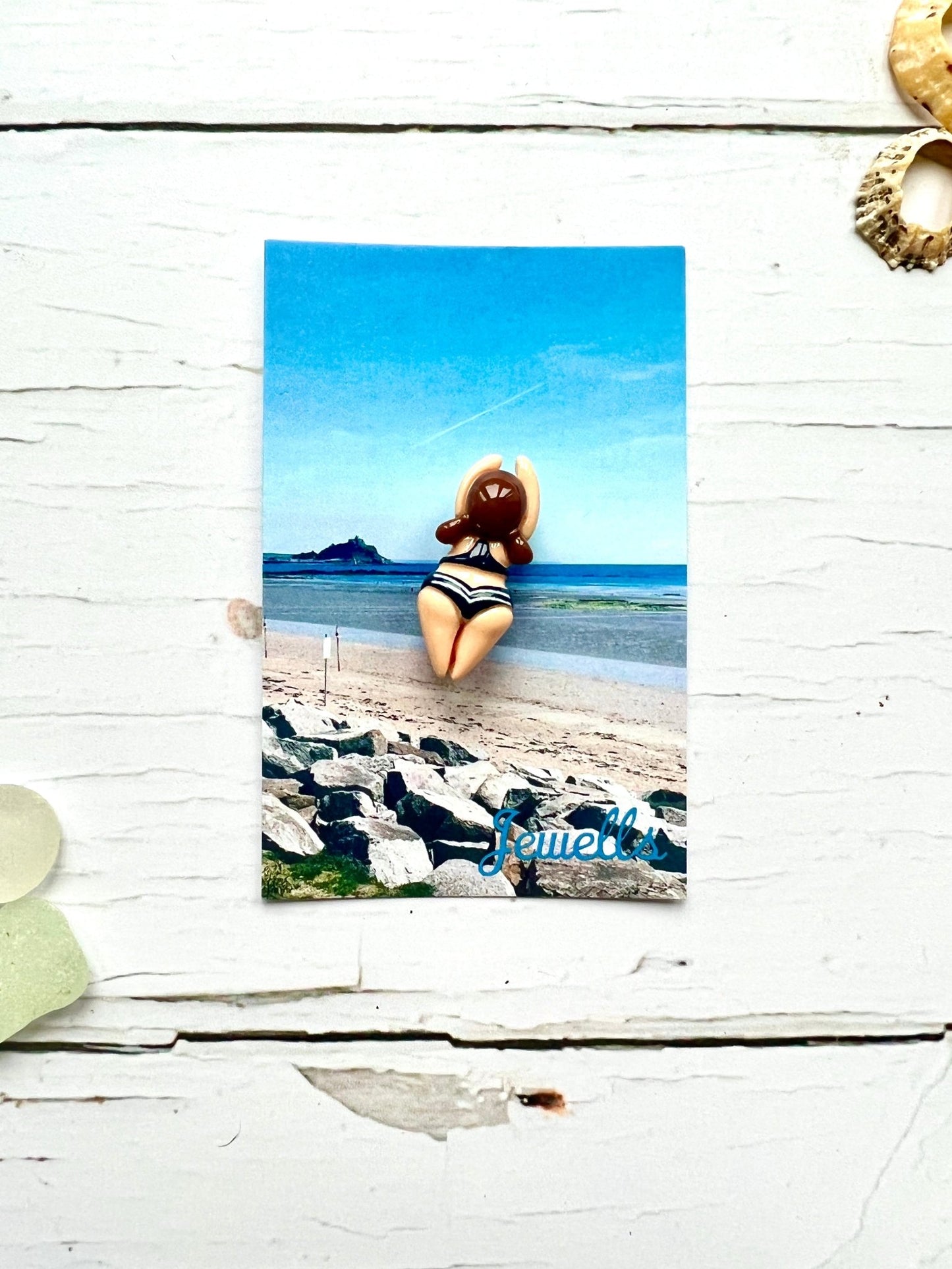 jolly swimmers brooch—beach-themed badge with blue bikini figure, handcrafted coastal pin for summer lovers