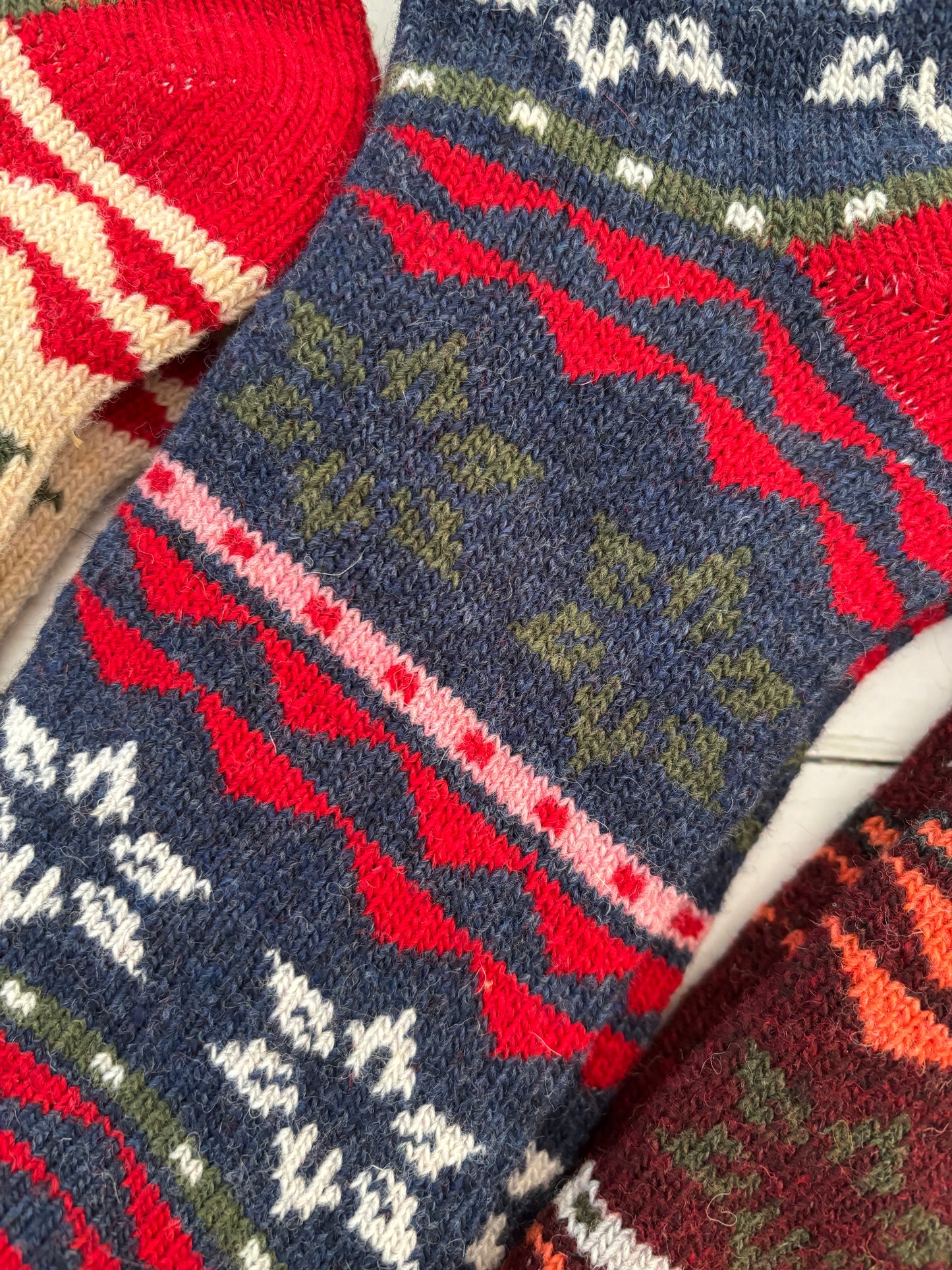 blue and red ladies’ Nordic thermal socks with wool—stylish, insulating, and ideal for festive winter warmth