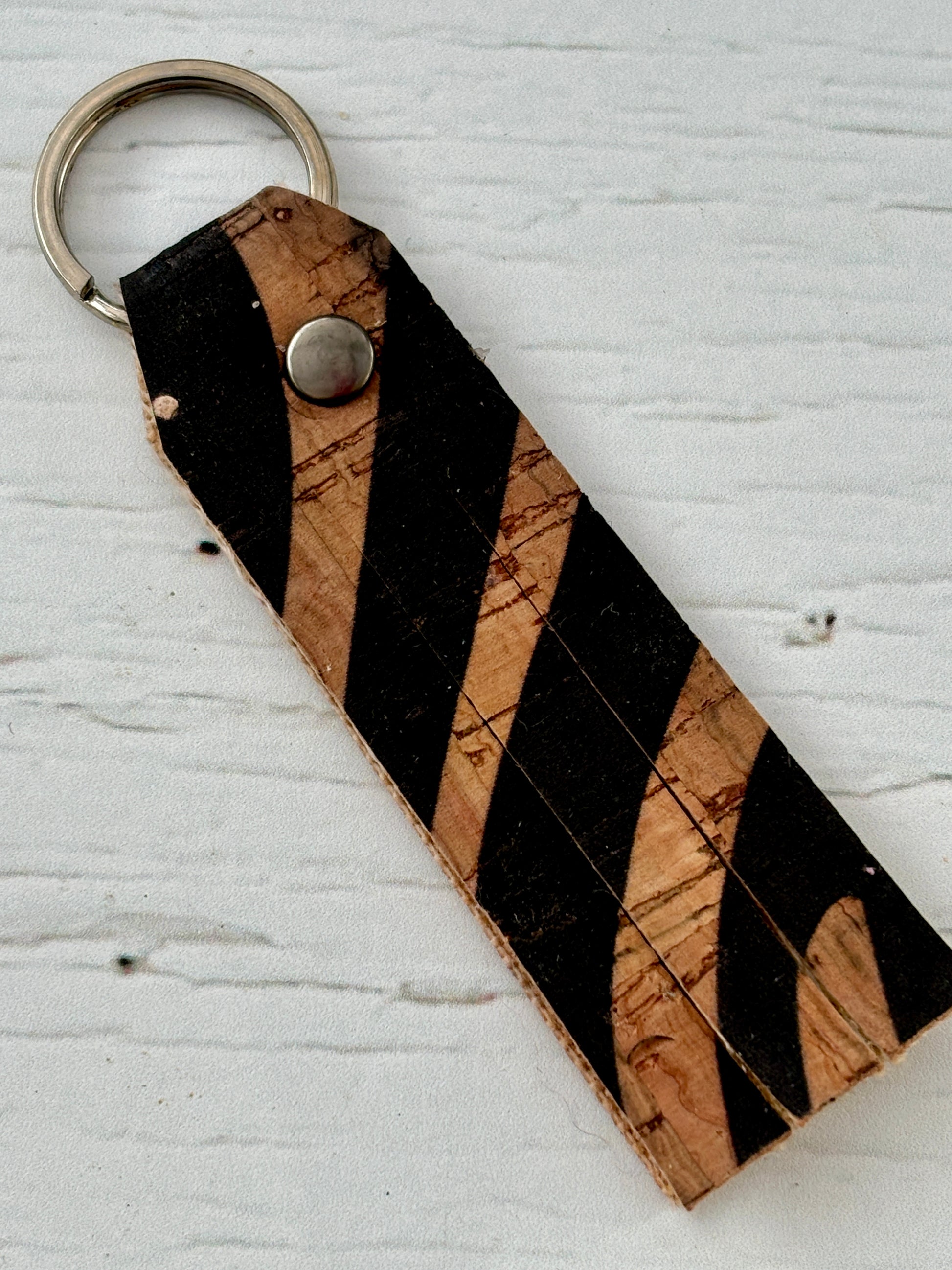 black cork key fob—super soft leather offcut with bold stripe detail, lightweight, and perfect for eco-conscious everyday carry