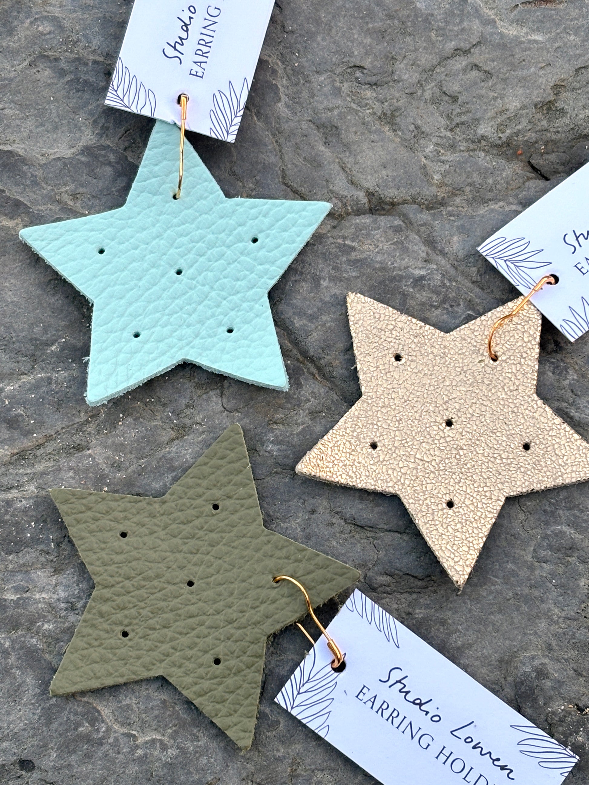 hand-cut leather star earring holder—colorful, compact, artisan-made organizer for studs and small hoops