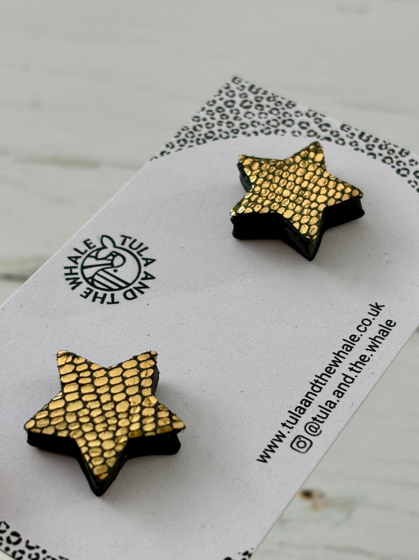 gold snake print leather star stud earrings with black edges - handmade statement earrings by Tula and the Whale