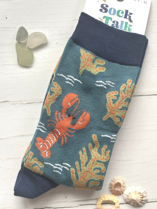 men's bamboo socks by Sock Talk featuring a knitted orange lobster and olive seaweed on a teal background coastal novelty apparel
