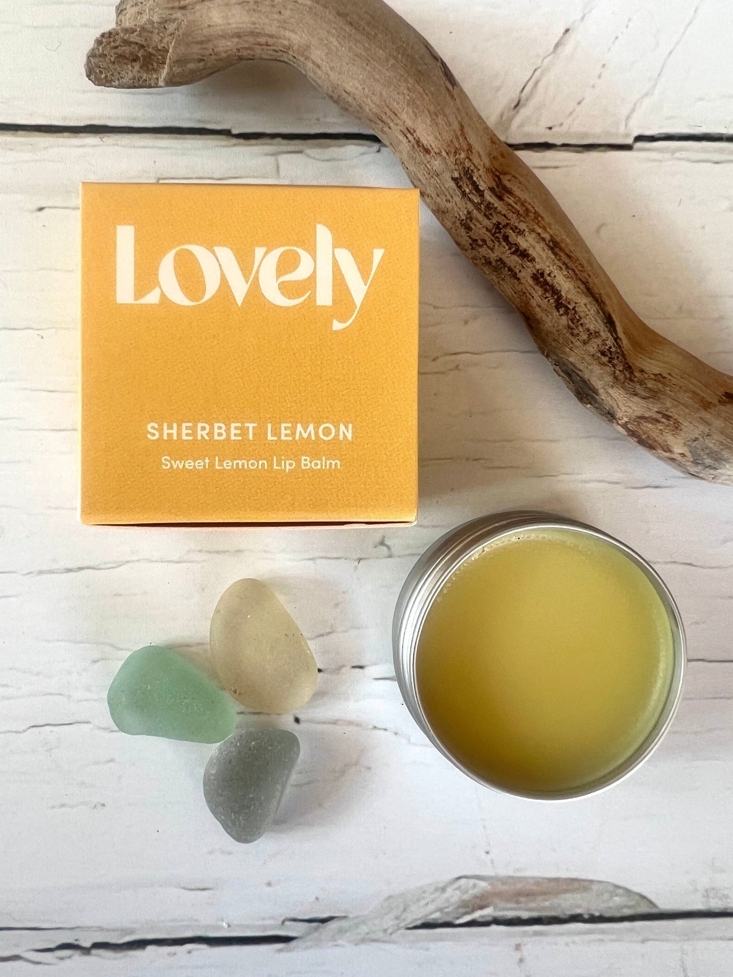 lovely sweet lemon lip balm—handmade, zesty and hydrating blend in a yellow tin for natural skincare and sunny gifting
