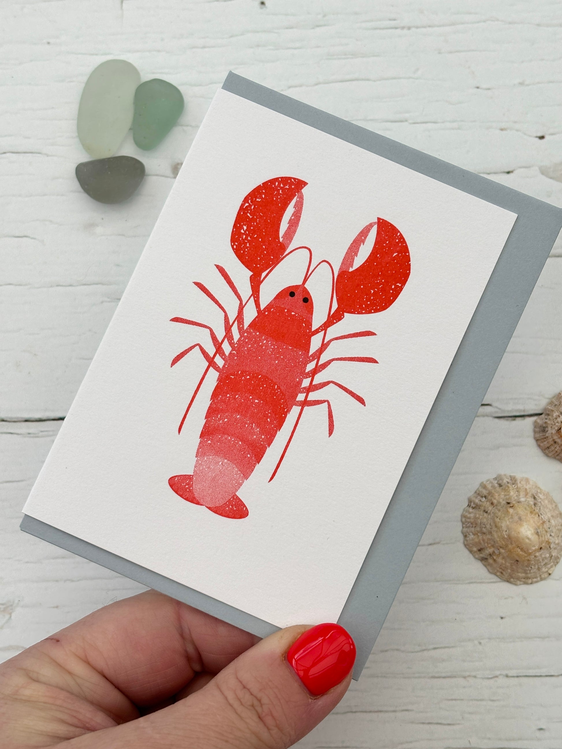 red lobster greeting card with textured print on white background, gray envelope, coastal nautical stationery gift