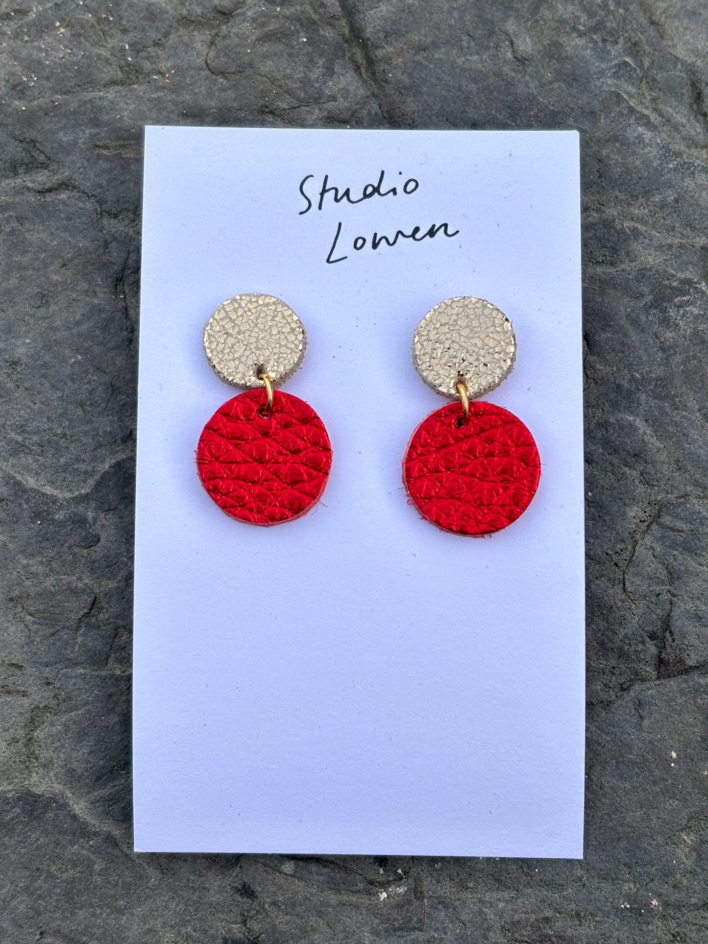 metallic red leather drop earrings—handmade, gold-accented, bold holiday style with lightweight modern texture