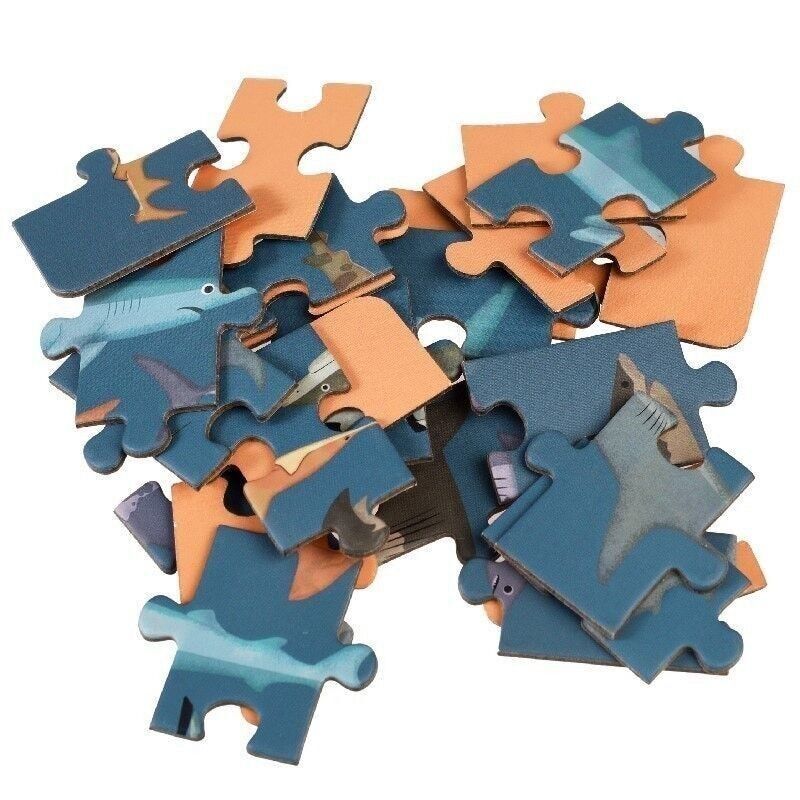 mini sharks jigsaw puzzle pieces scattered blue and orange, marine animal theme 24-piece Rex London kids travel toy