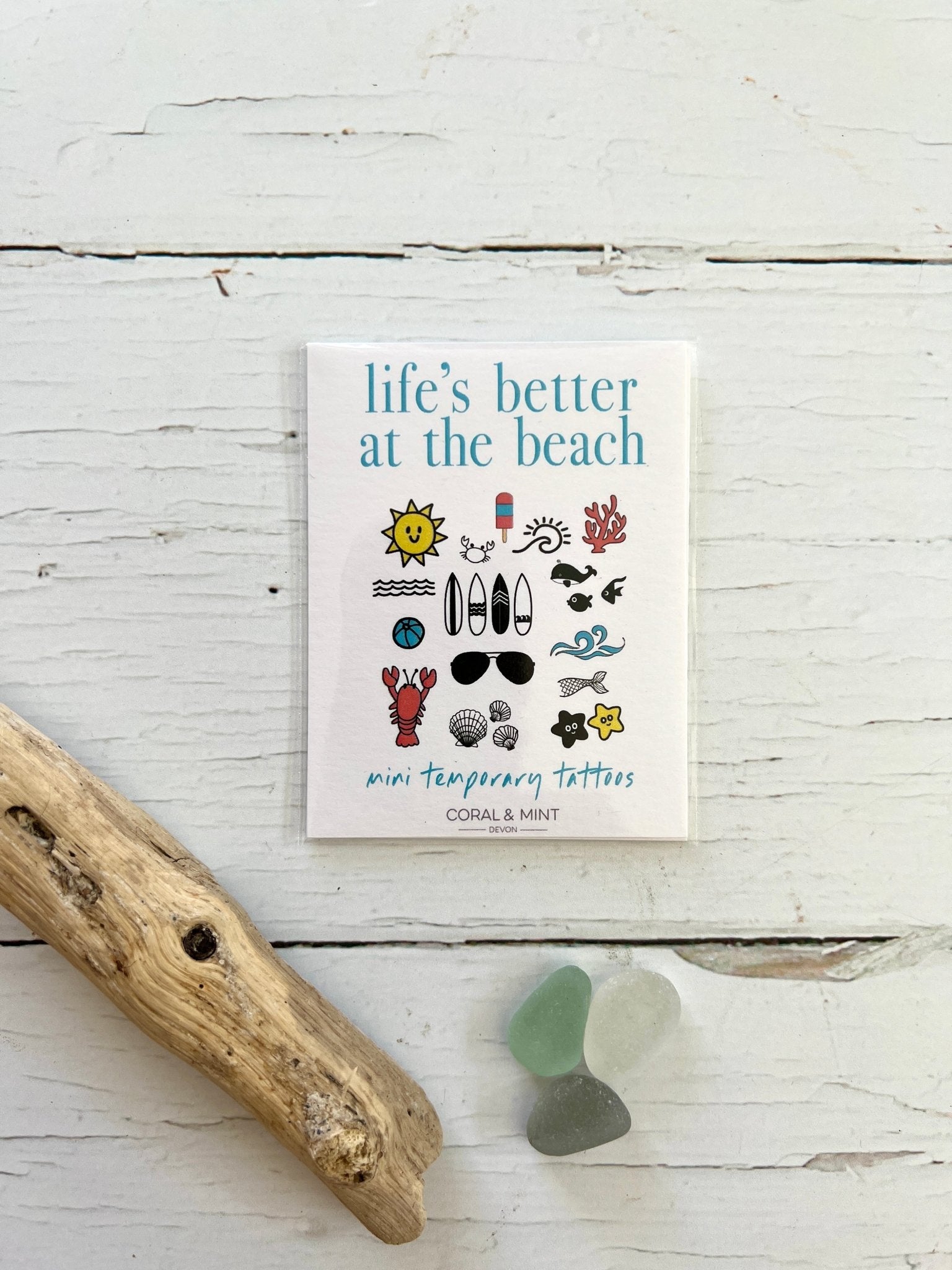 beach-themed mini temporary tattoo set with sun, surfboards, and sea creatures—perfect for summer fun and coastal gifting