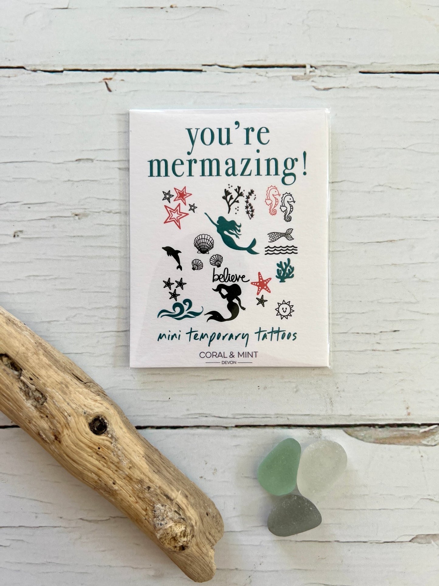 mermaid-themed mini temporary tattoo set with seashells, dolphins, and sea creatures—perfect for beach lovers and kids