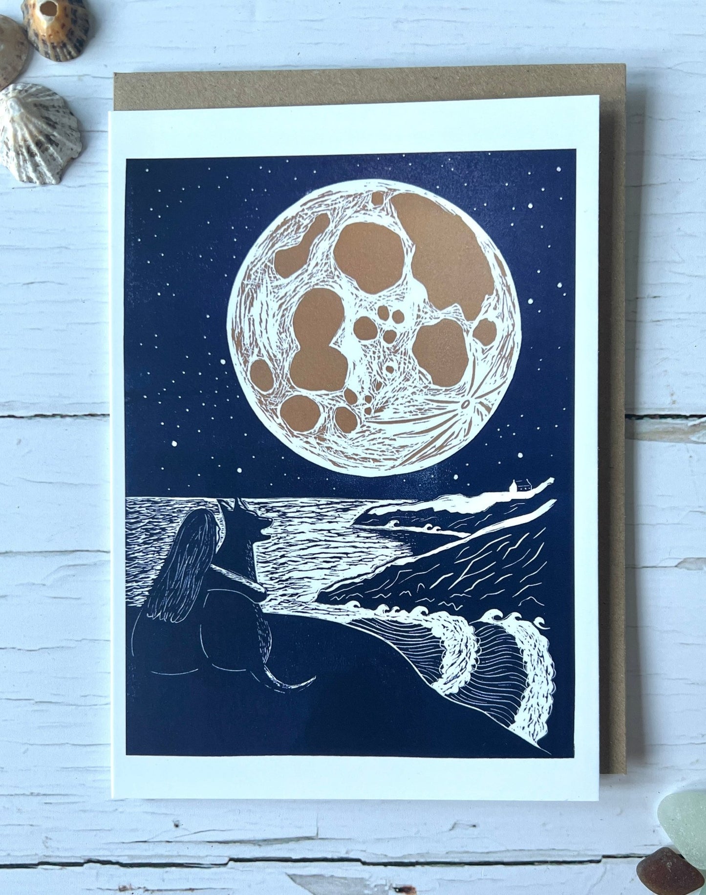 artistic moon-gazing card with coastal cliff, dog companion, and textured night sky—whimsical, nature-inspired stationery
