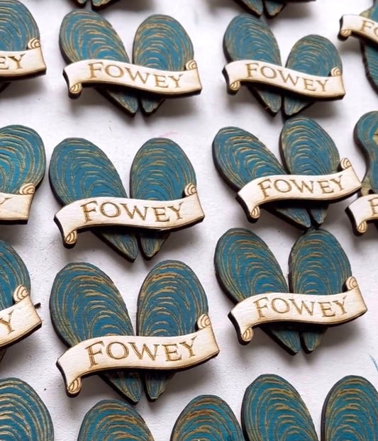 Fowey mussel heart magnets batch of laser-cut wooden magnets shaped like mussel shells and hearts with a Fowey banner Coastal souvenir art