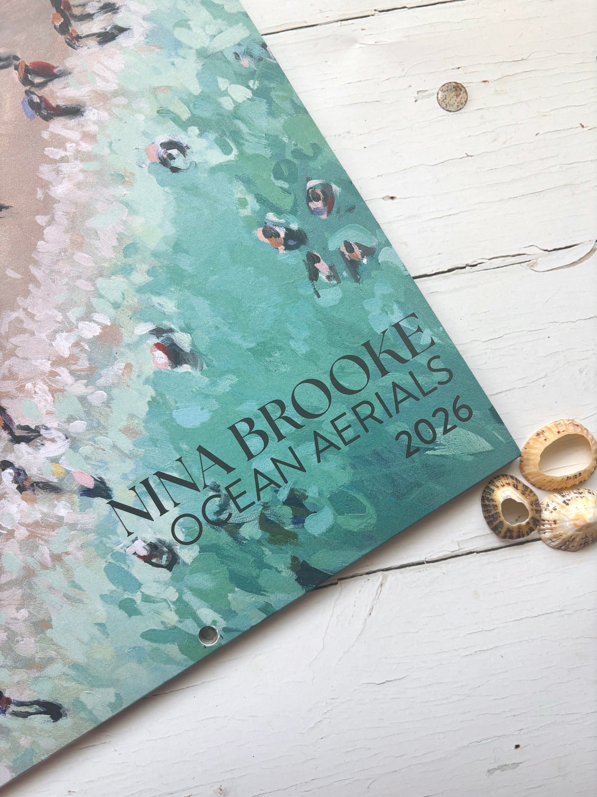 Nina Brooke Ocean Aerials 2026 calendar—artful beach scene cover, perfect for coastal décor, planning, and creative gifting