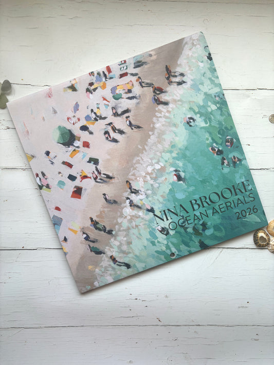 Nina Brooke Ocean Aerials 2026 calendar—vibrant beach art cover, perfect for coastal décor, planning, and creative gifting