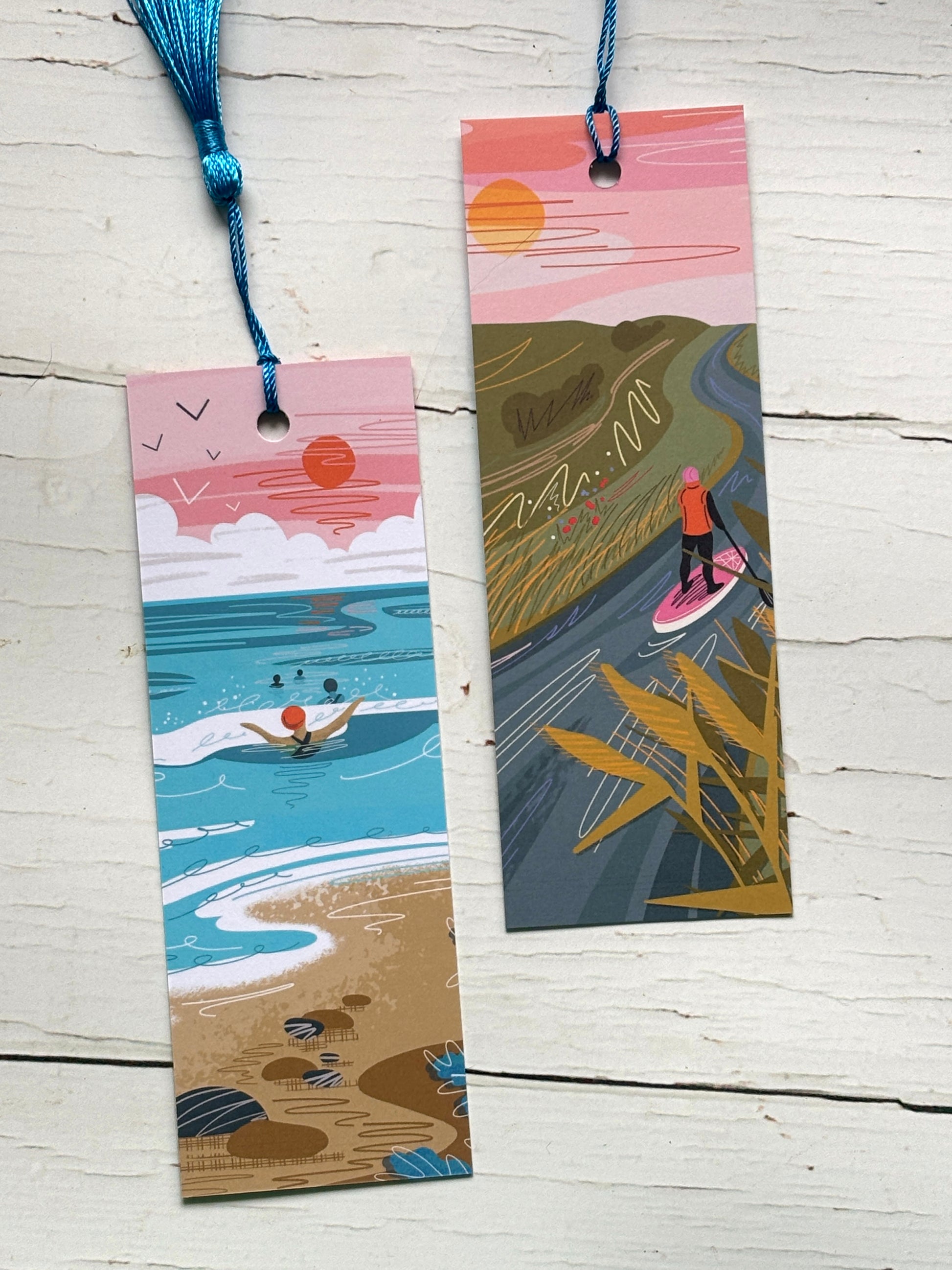 two coastal & river scene bookmarks vibrant illustration of paddleboarding and wild swimming Coastal art gift with blue tassels