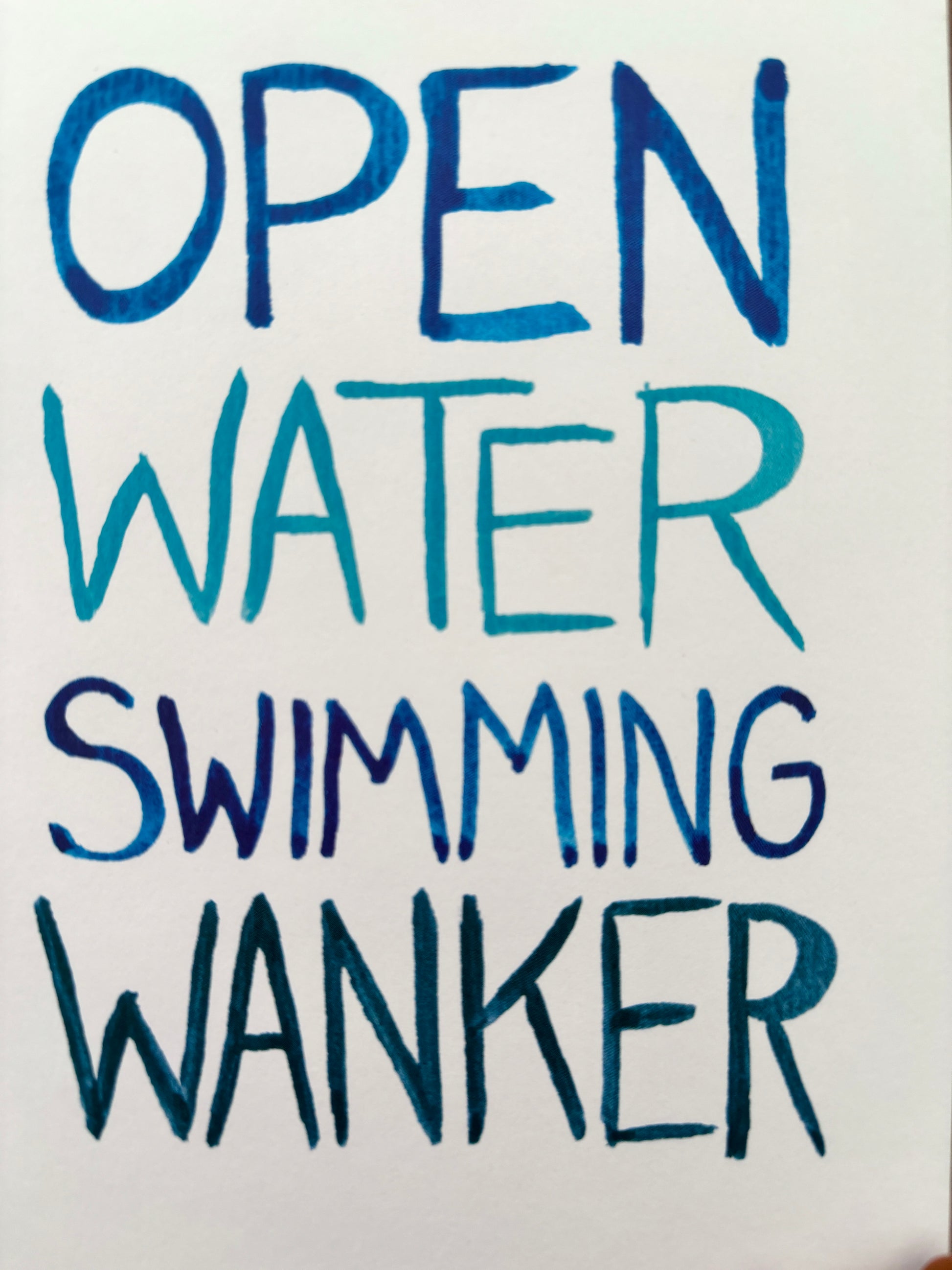 closeup shot of open water swimming wanker greeting card funny, bold, blue hand-lettered text novelty, wild swimming, birthday gift
