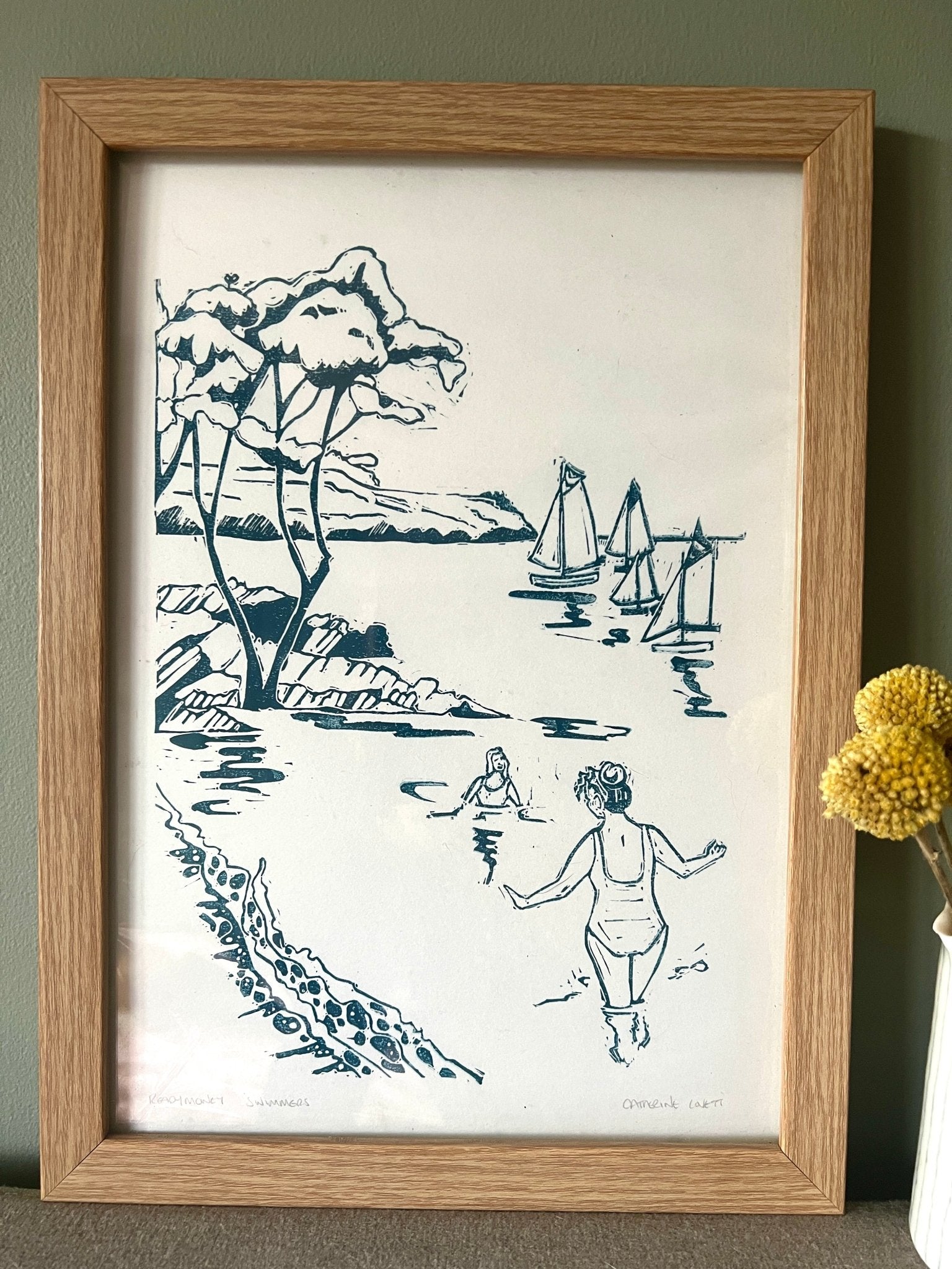 original framed lino print Swimmers at Readymoney Cove, Fowey, Cornwall Catherine Loft hand-drawn sea-themed wall art