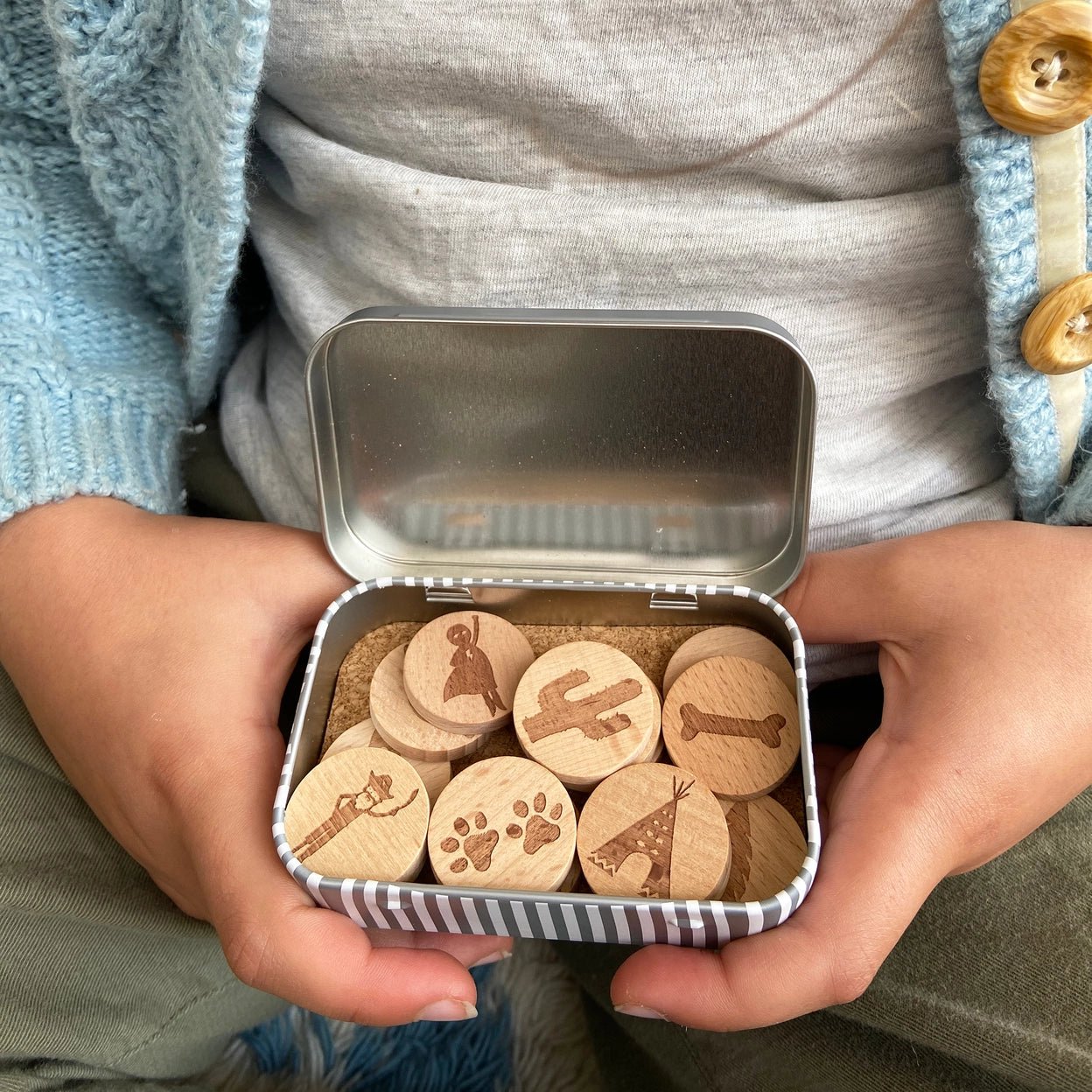 outdoor adventure wooden story tokens in hand Jodie Gale engraved discs for nature play, sensory bin activity, kids gift