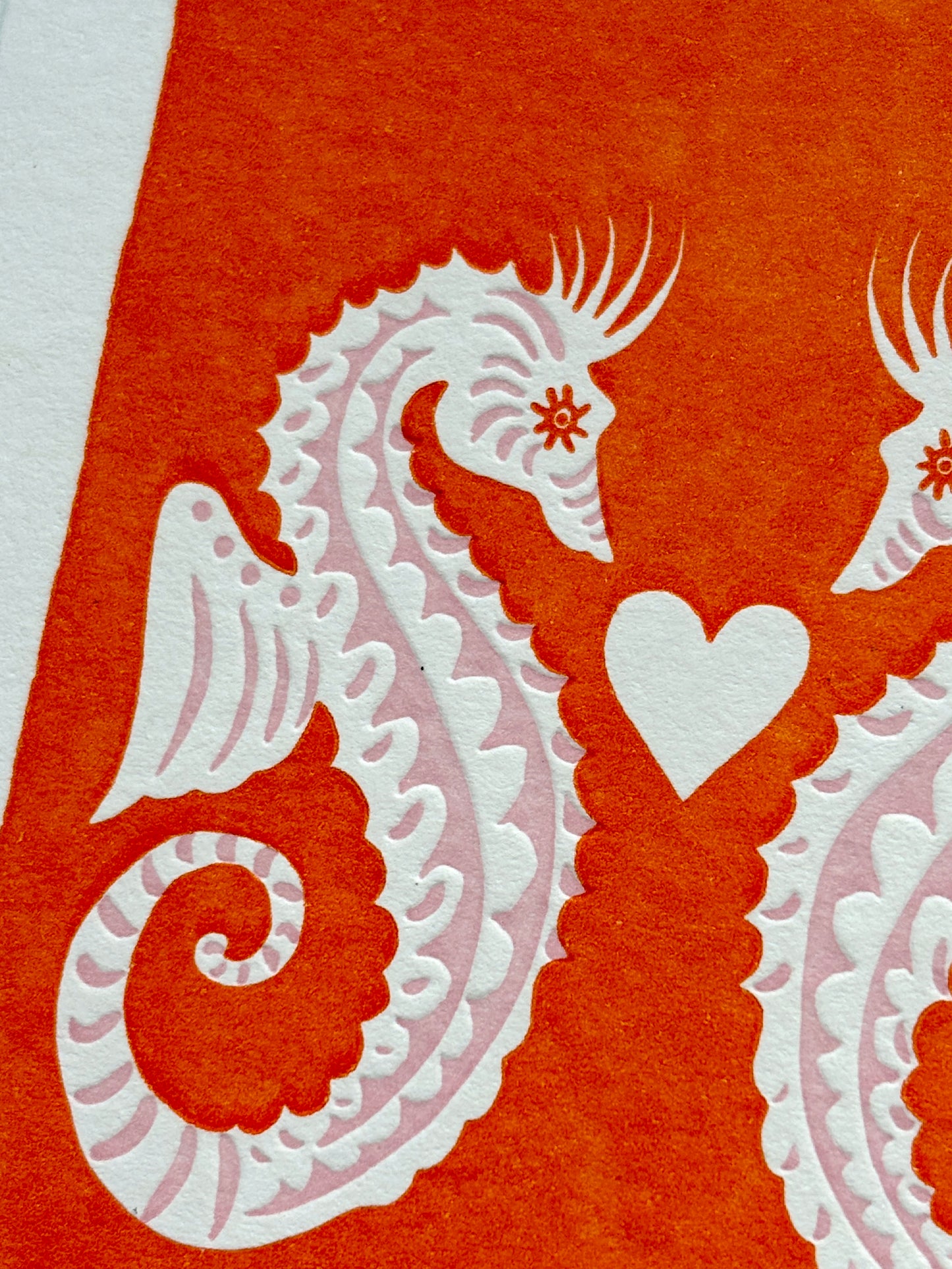 close-up pair of seahorses love card vibrant orange and pink relief print unique Valentine's Day or engagement greeting