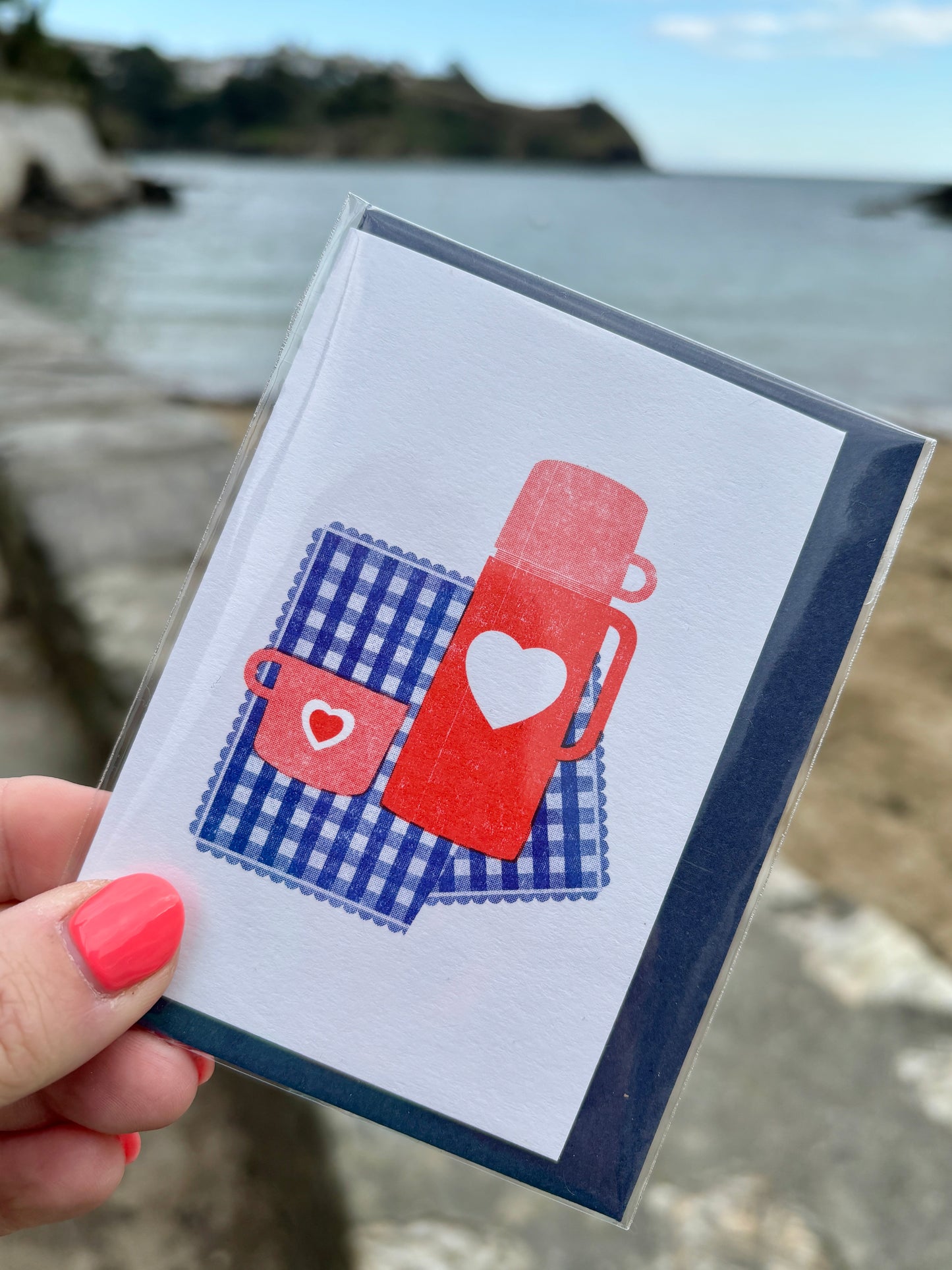 mini greeting card picnic illustration with red thermos, heart, and blue gingham blanket blank note card, coastal beach theme